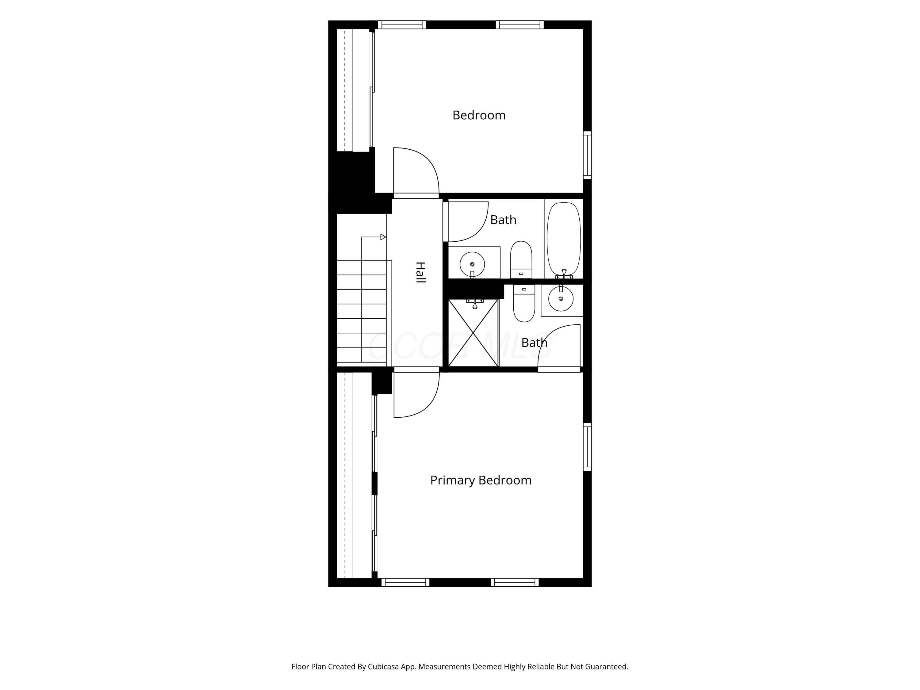 Floor plan showing a bedroom, primary bedroom, hall with stairs, and two bathrooms.