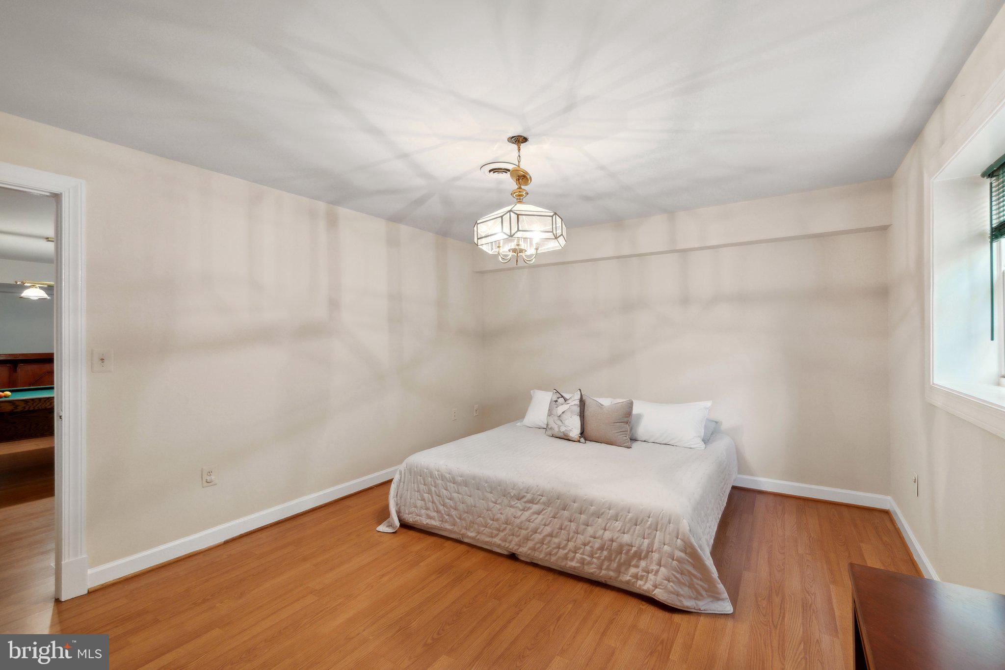 6105 WOODLAND STREAM DRIVE