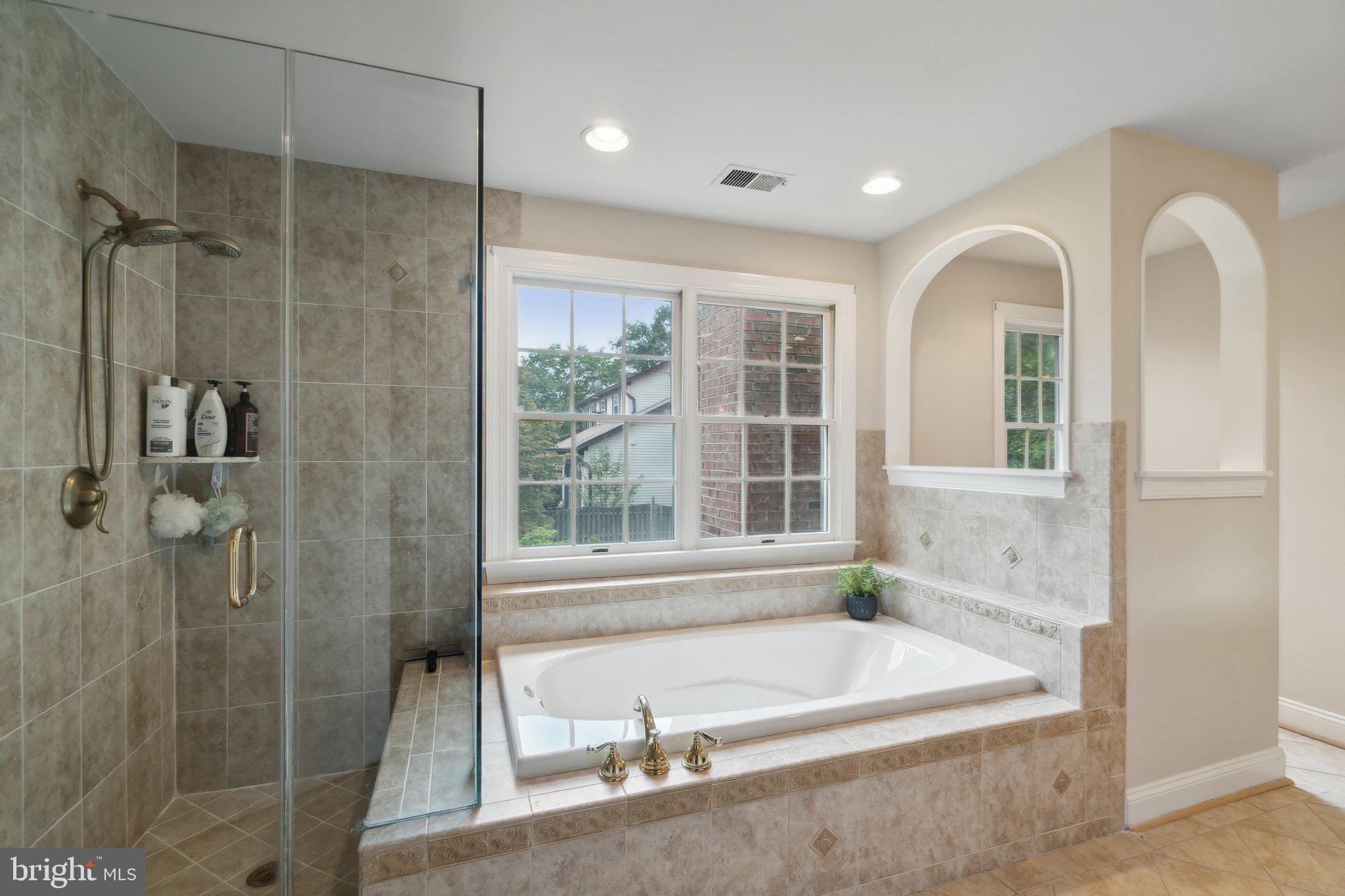 6105 WOODLAND STREAM DRIVE