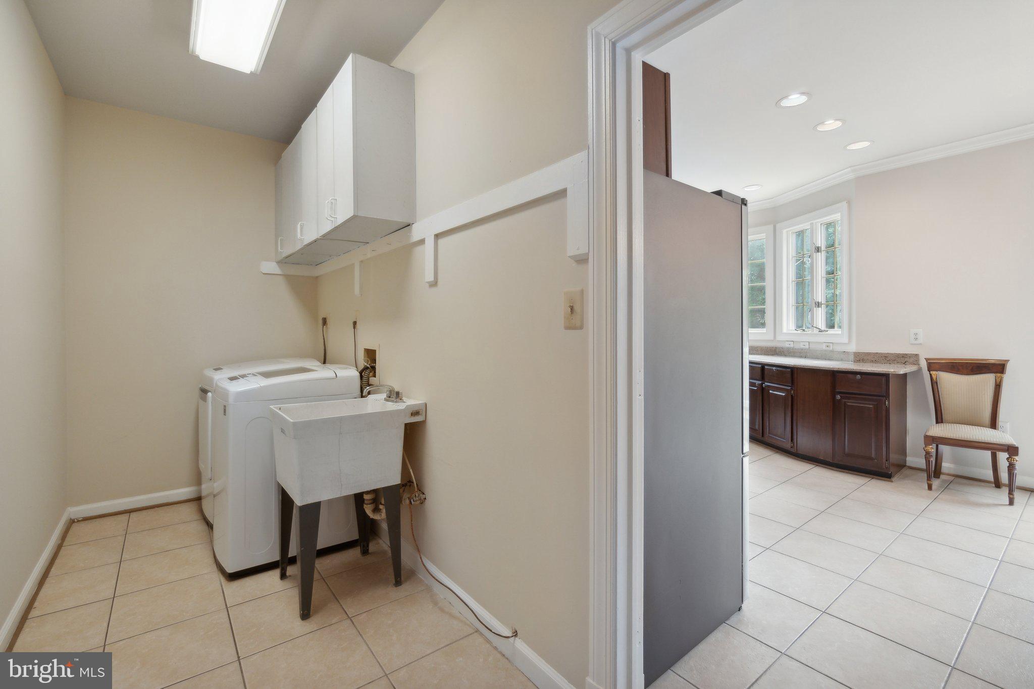 6105 WOODLAND STREAM DRIVE