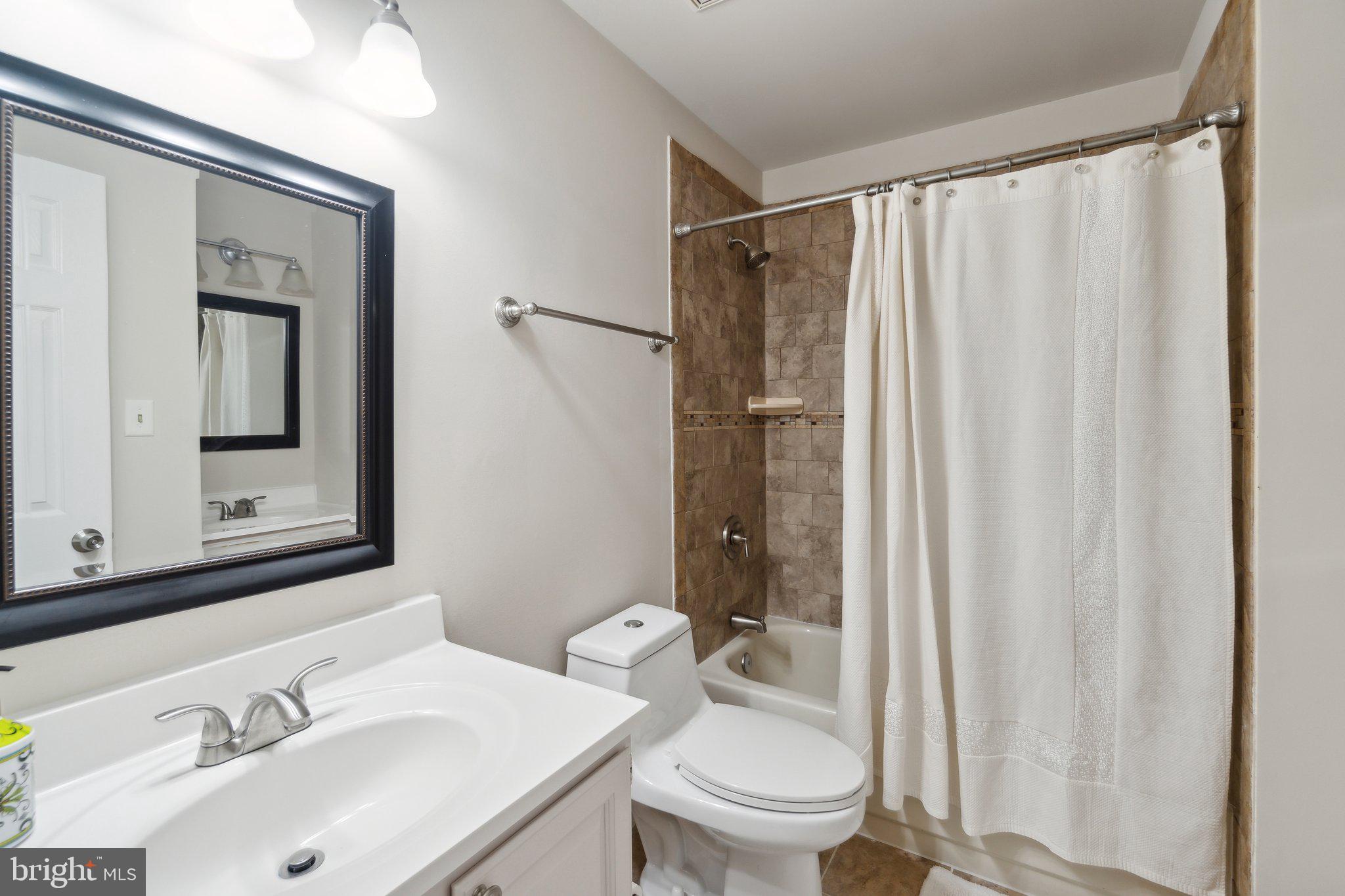 6105 WOODLAND STREAM DRIVE