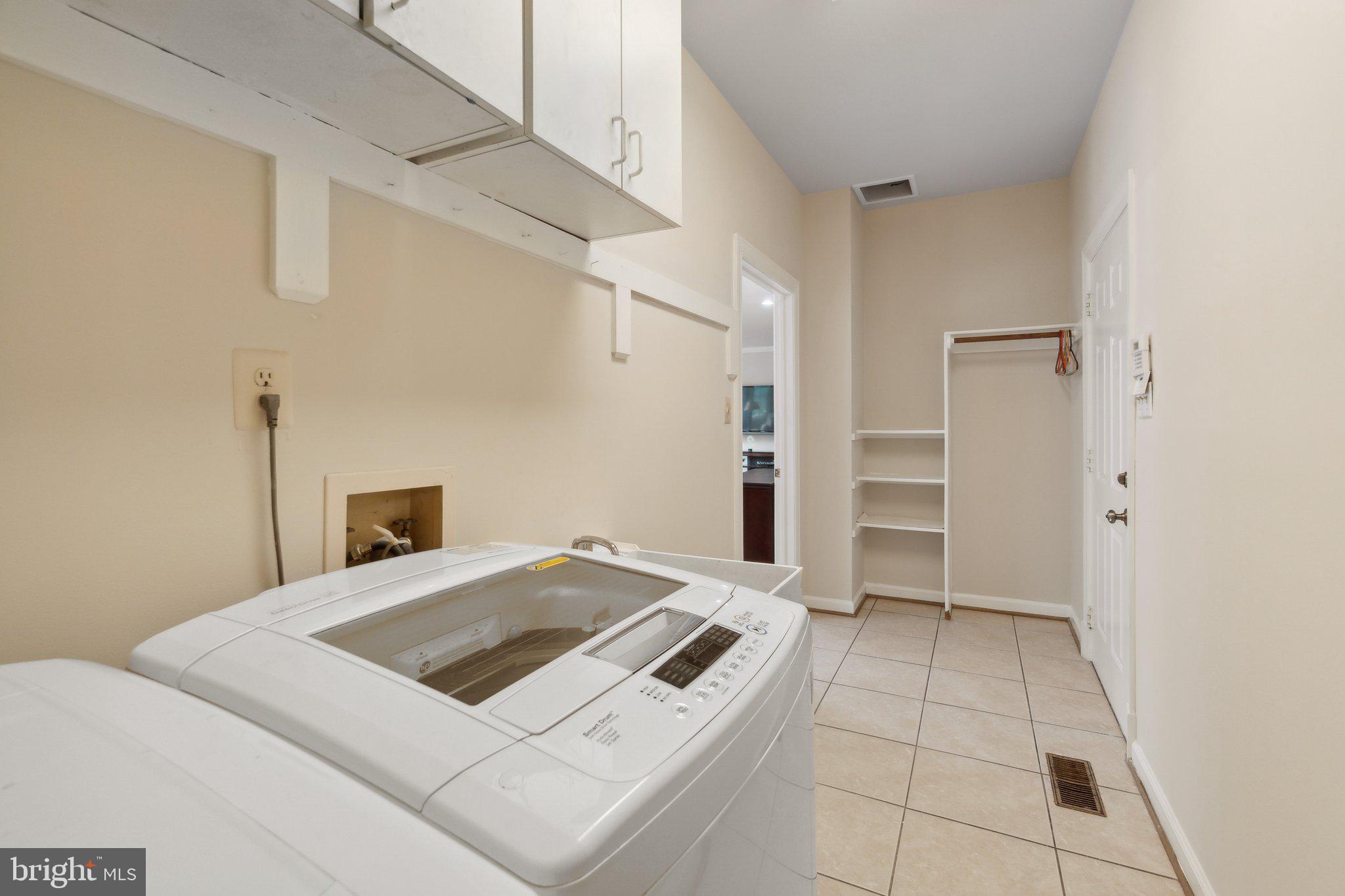 6105 WOODLAND STREAM DRIVE