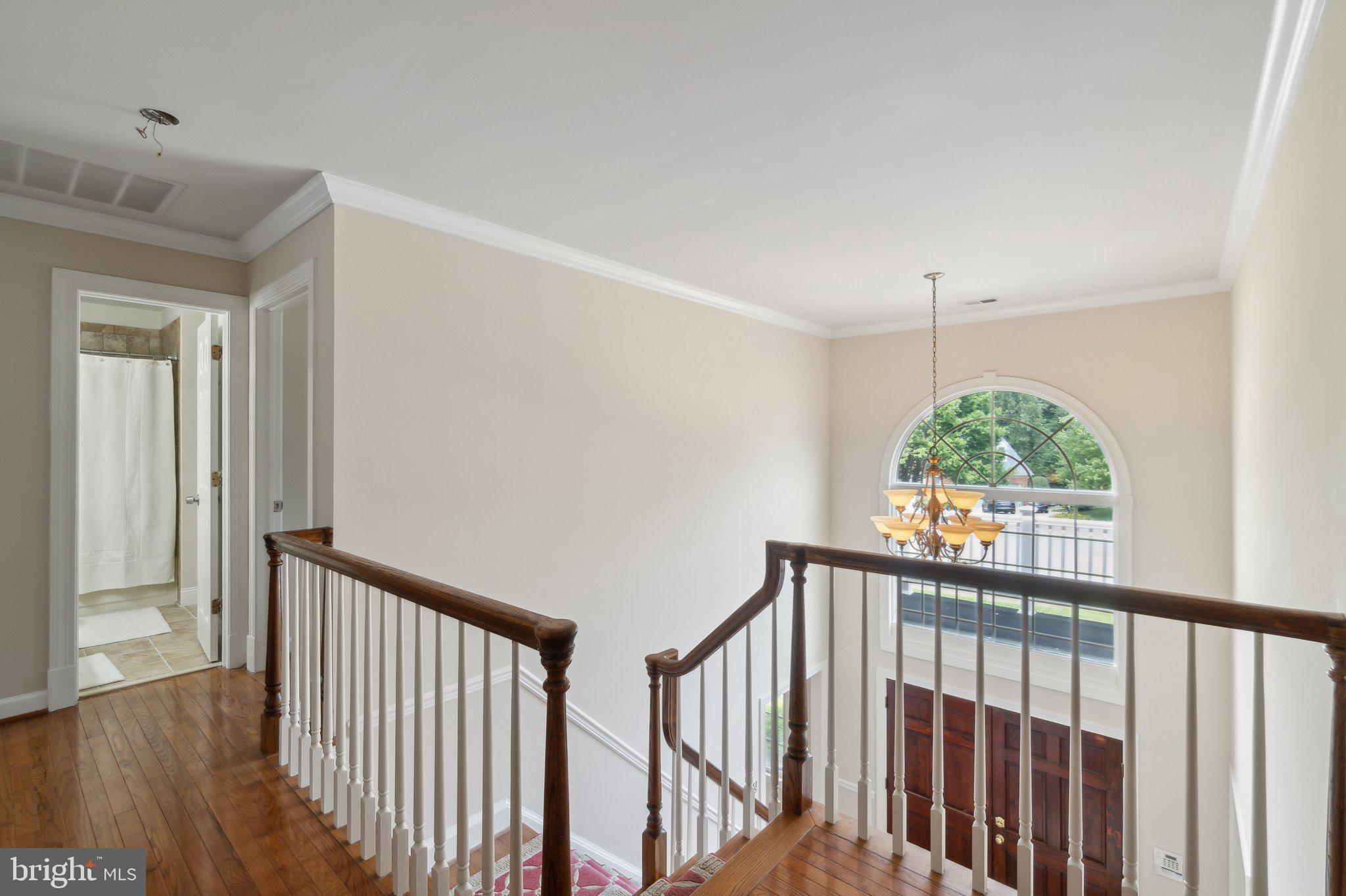 6105 WOODLAND STREAM DRIVE