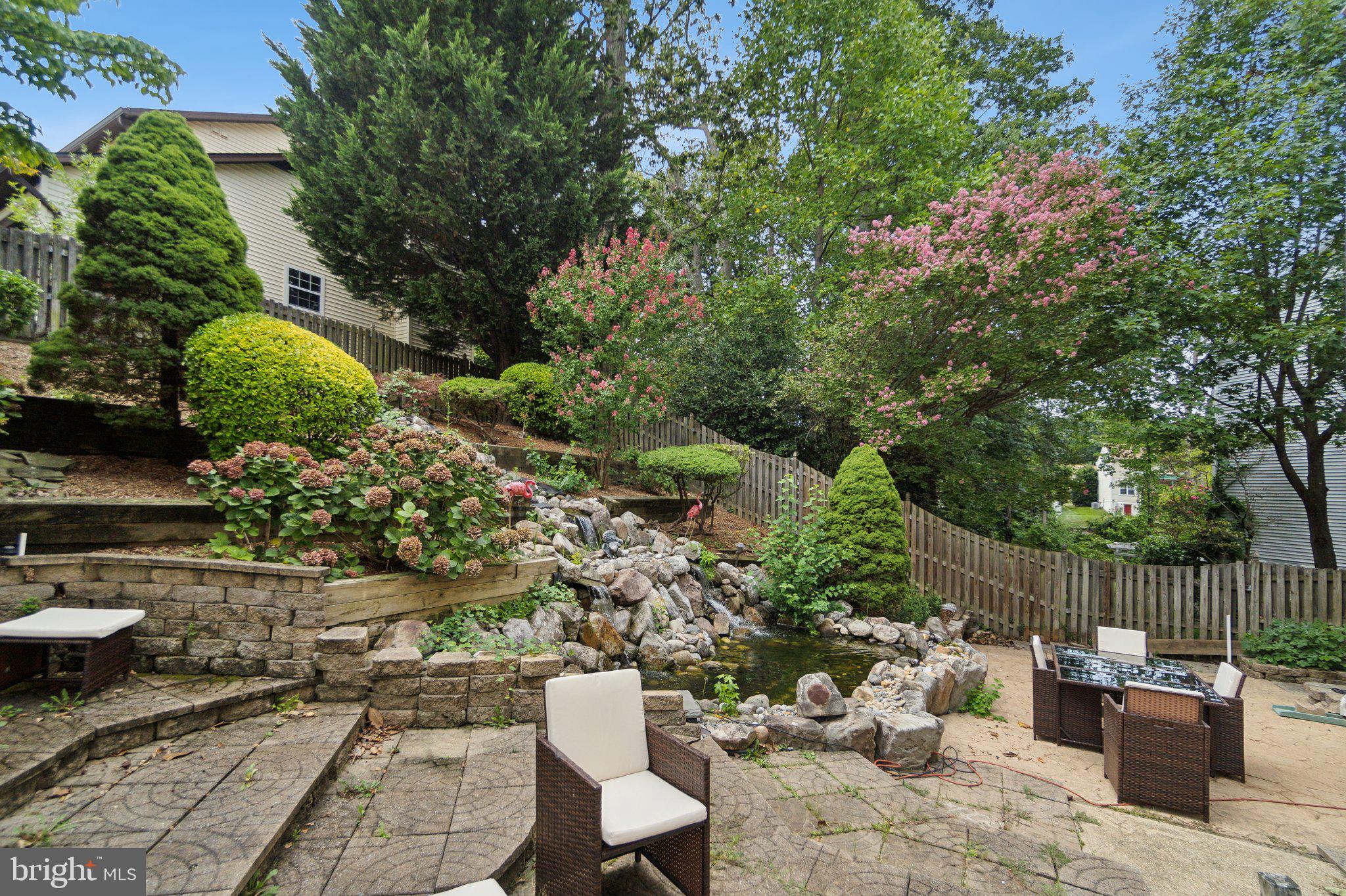 6105 WOODLAND STREAM DRIVE
