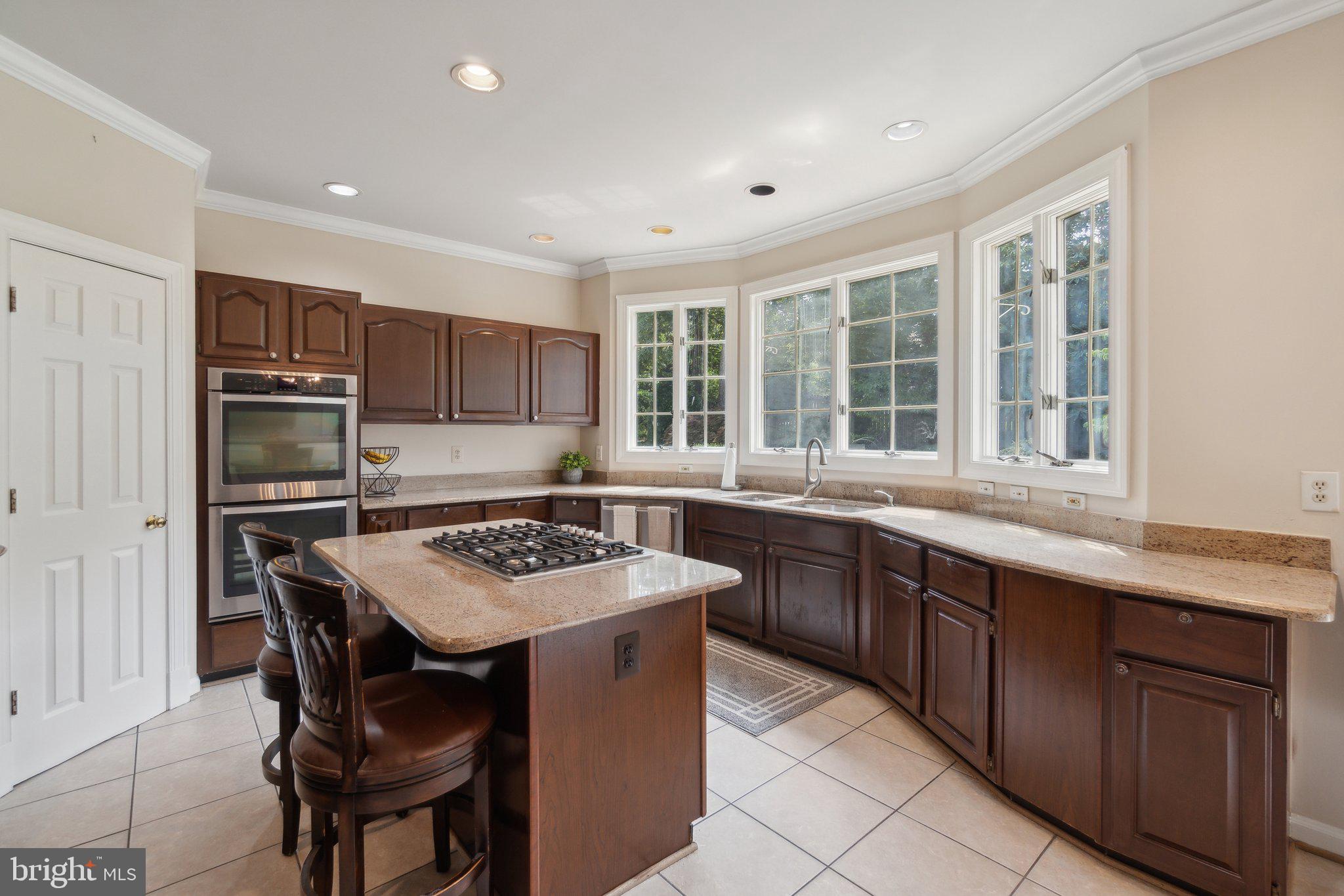 6105 WOODLAND STREAM DRIVE