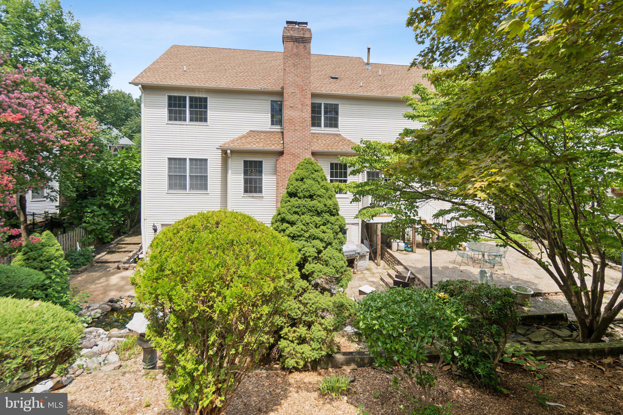 6105 WOODLAND STREAM DRIVE
