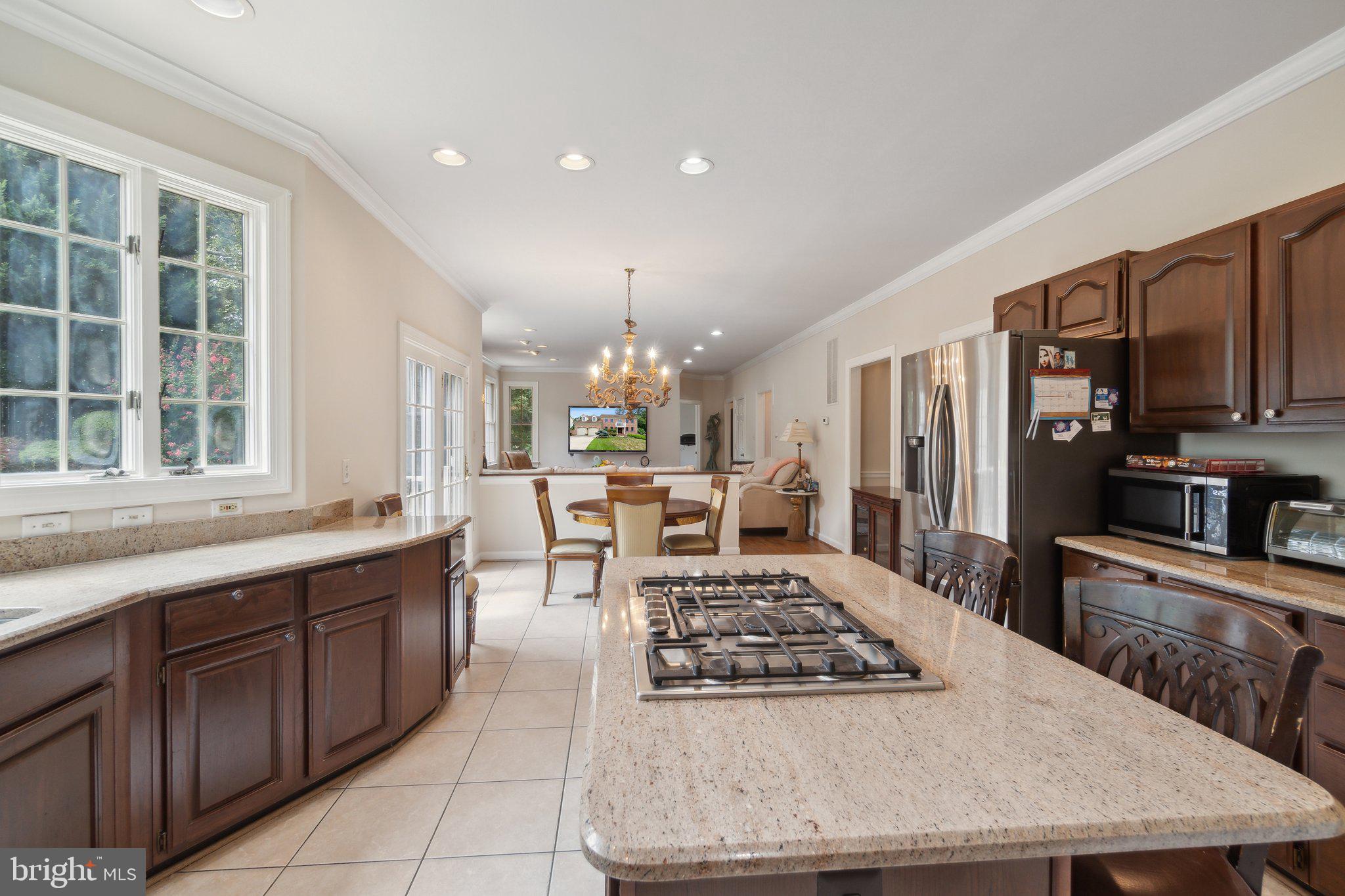 6105 WOODLAND STREAM DRIVE