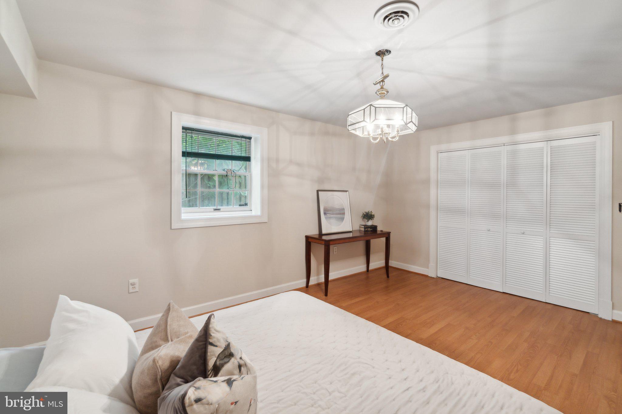 6105 WOODLAND STREAM DRIVE