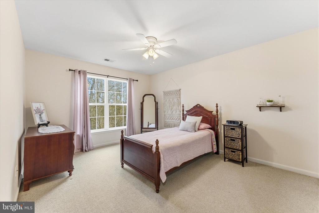 9325 RUSTIC BREEZE COURT