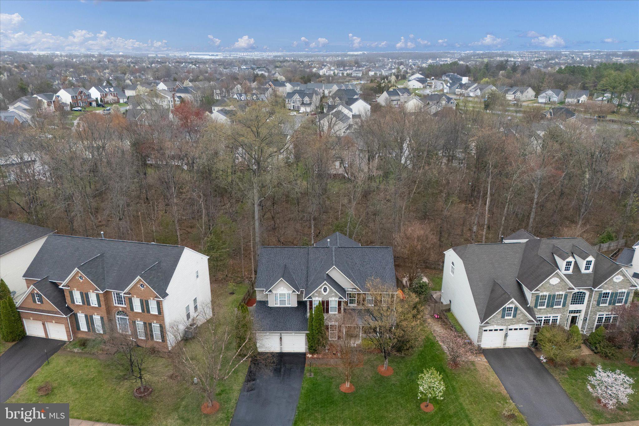 9325 RUSTIC BREEZE COURT