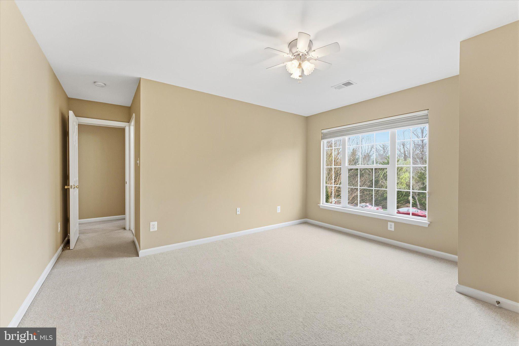 9325 RUSTIC BREEZE COURT