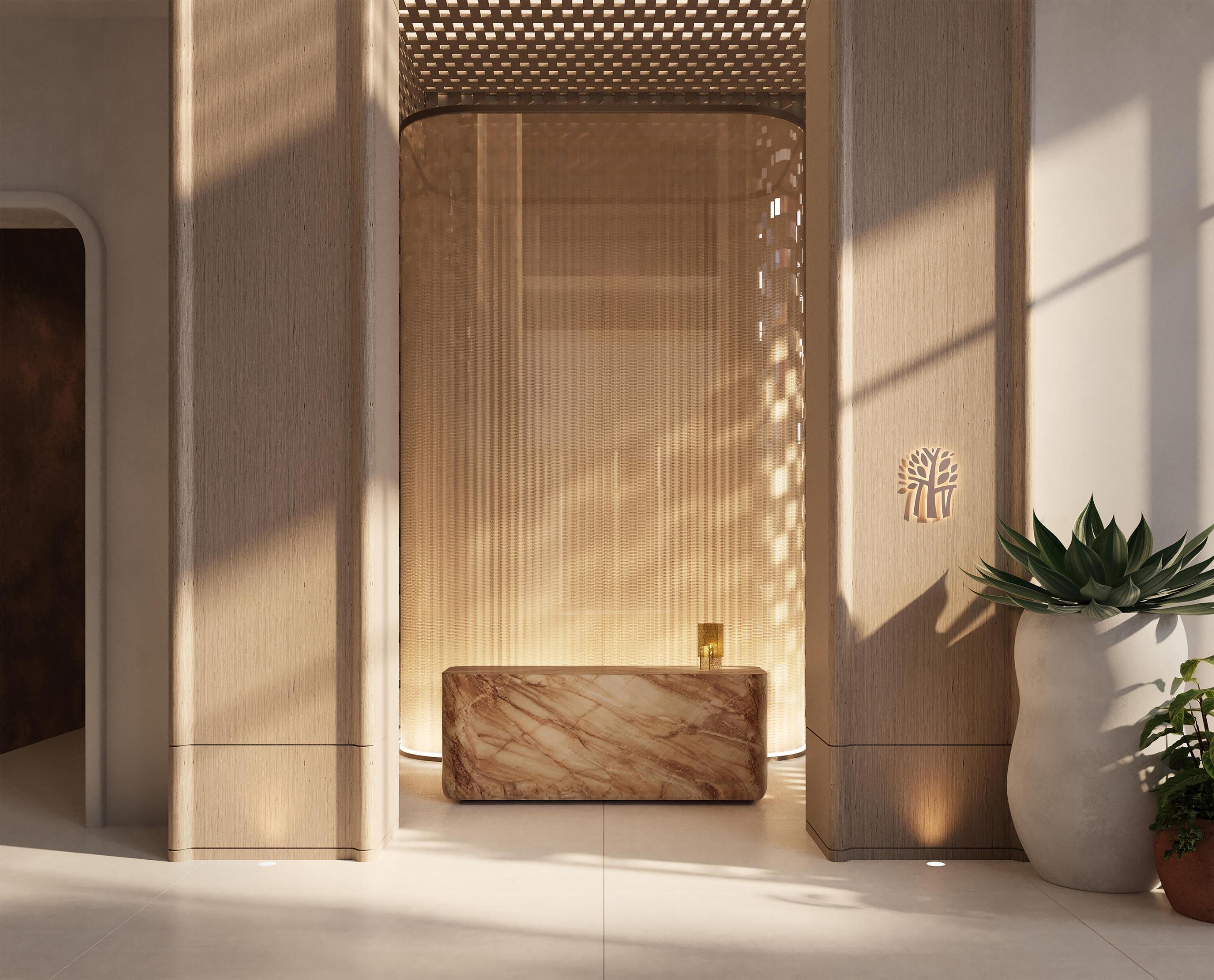 Luxury lobby with a marble reception desk, glowing backdrop, and wood-clad columns.