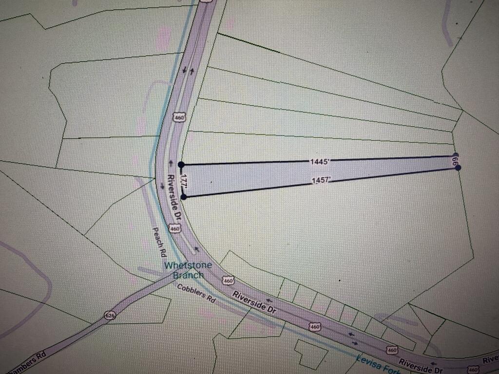 Map marking a long, narrow lot extending east from Riverside Drive, with parcel boundary measurements.