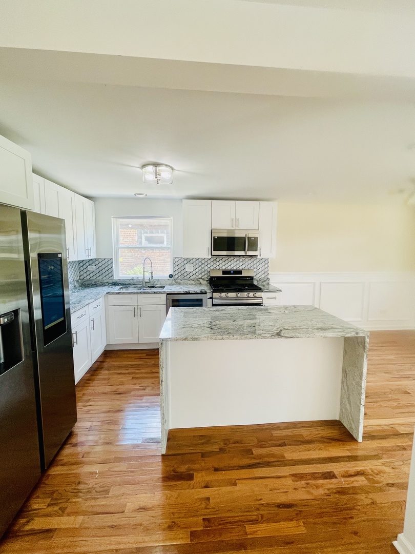 9233 S Burnside Avenue