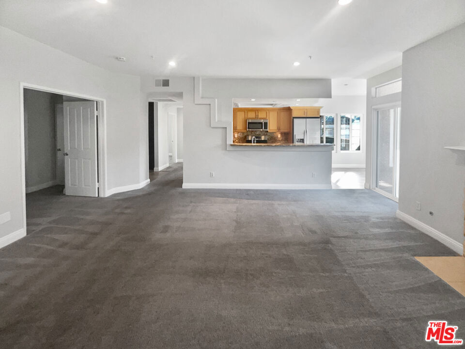 4561 Warner Avenue 202