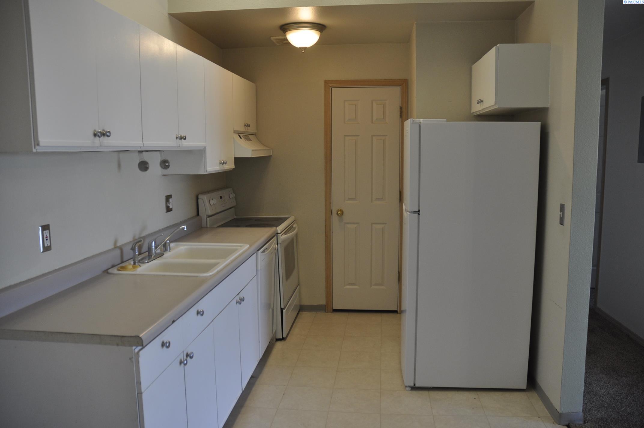 1645 NE MERMAN DR. #C-302