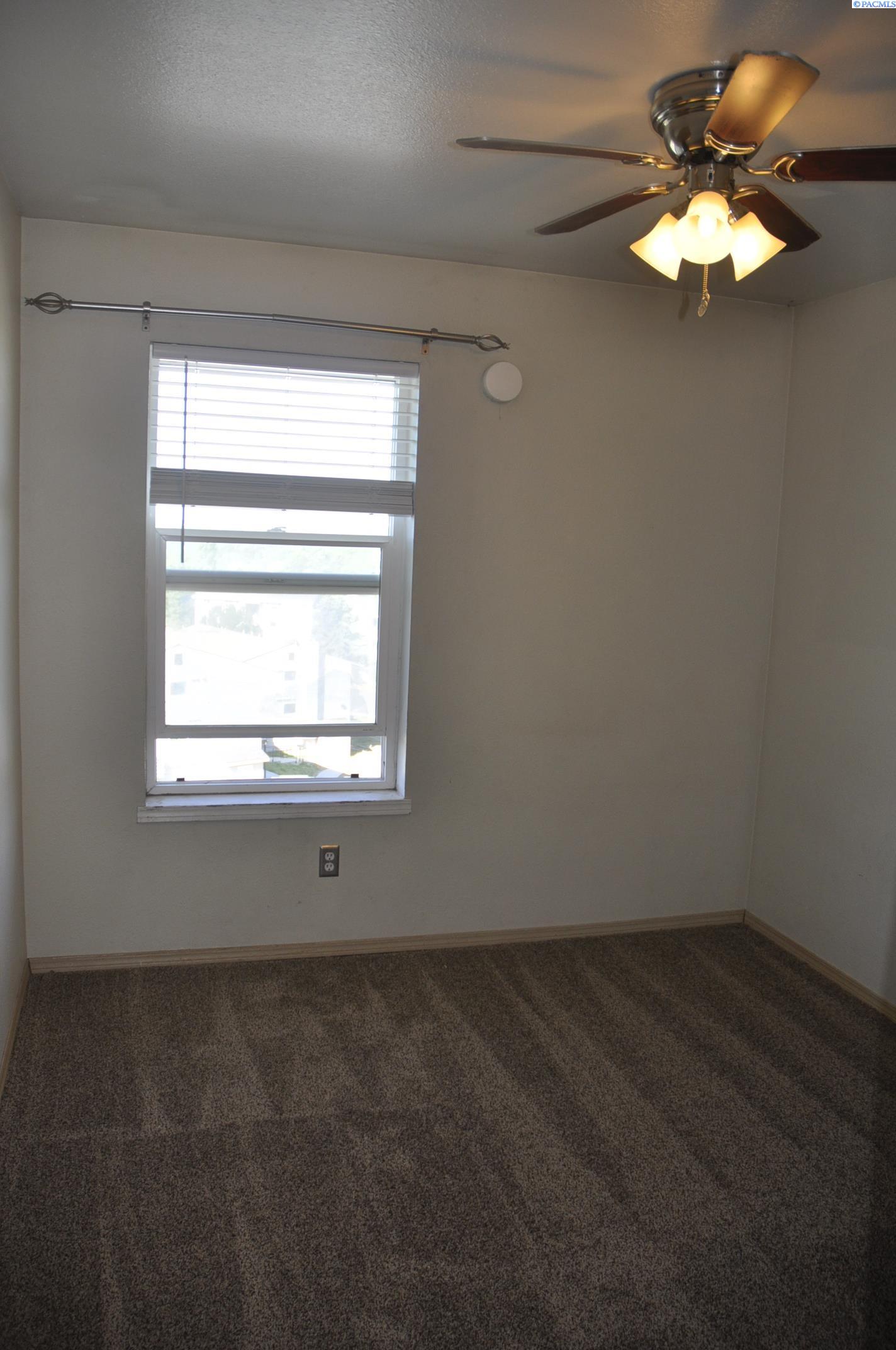 1645 NE MERMAN DR. #C-302