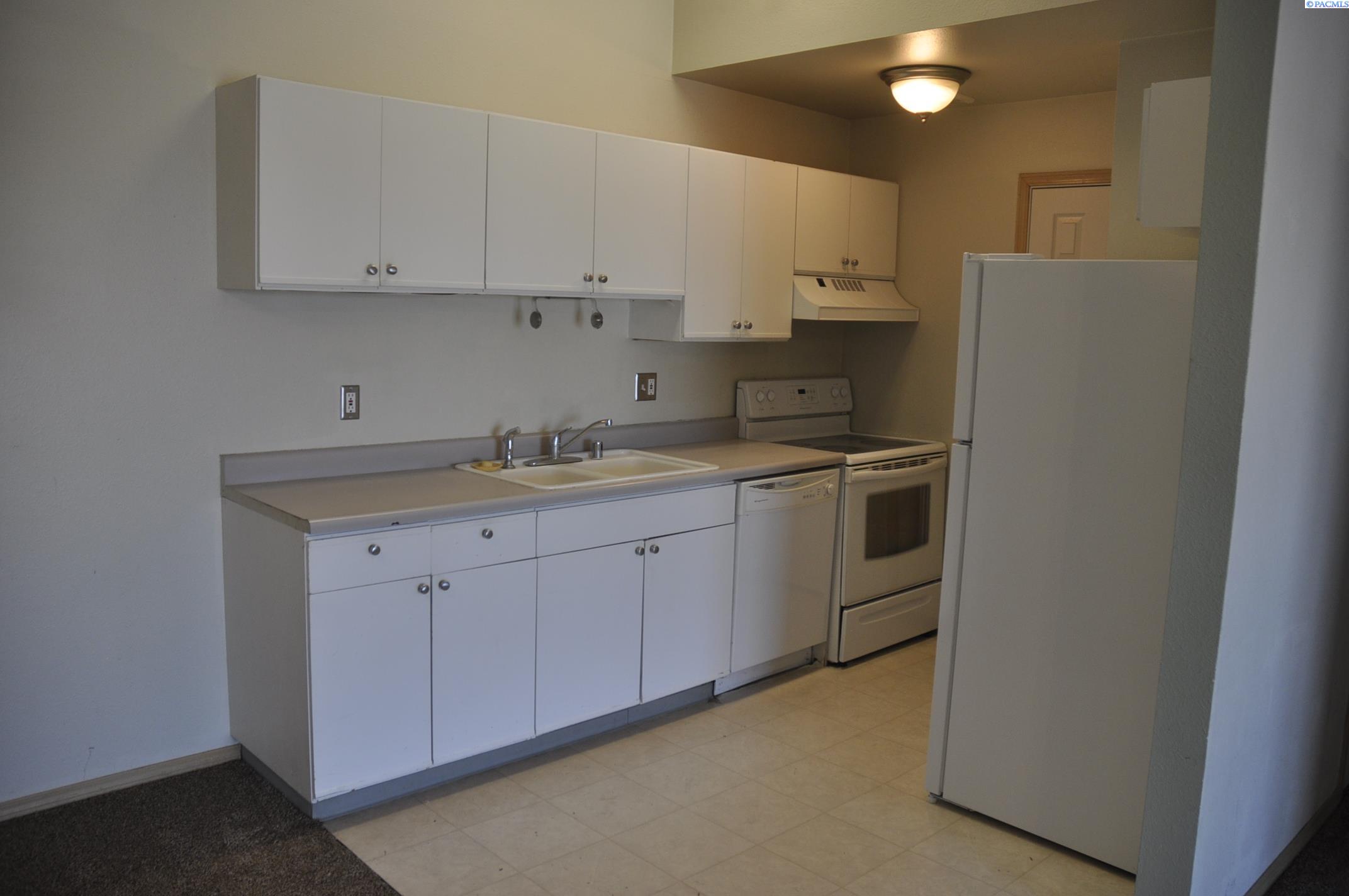 1645 NE MERMAN DR. #C-302