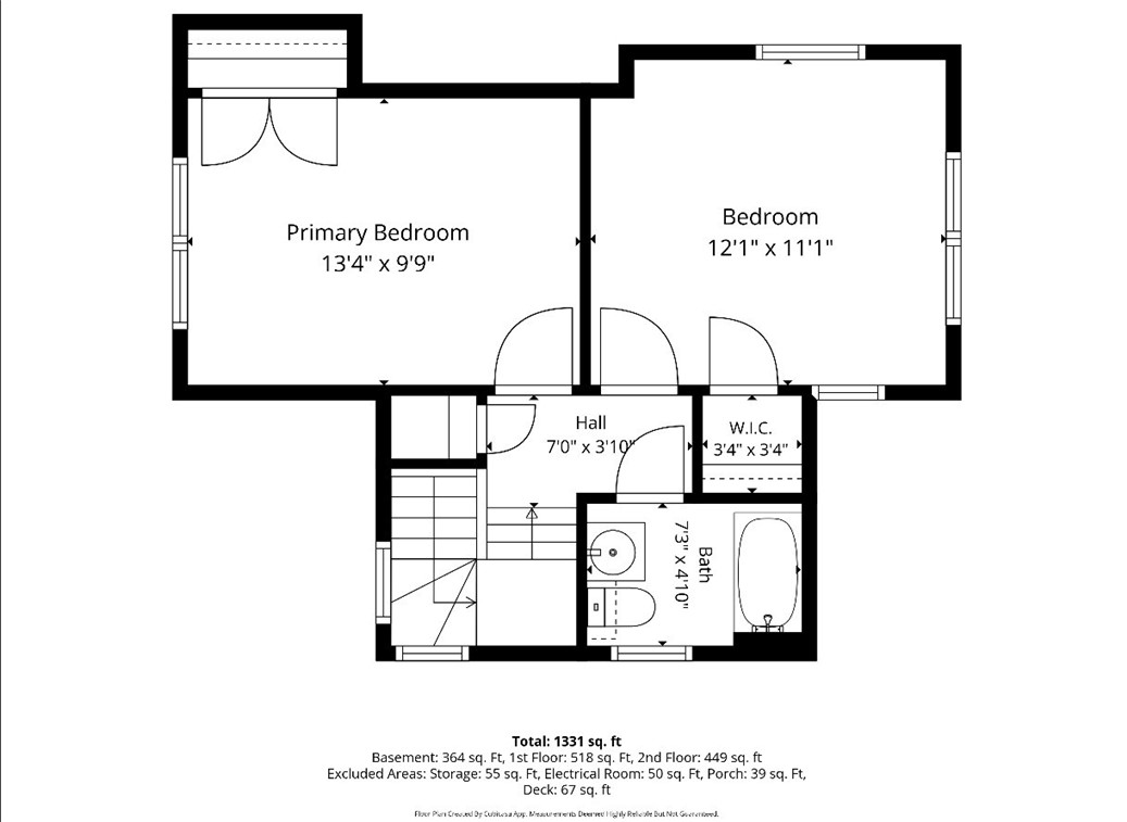 Floor plan showing two bedrooms, a hall, walk-in closet, bathroom, and stairway.