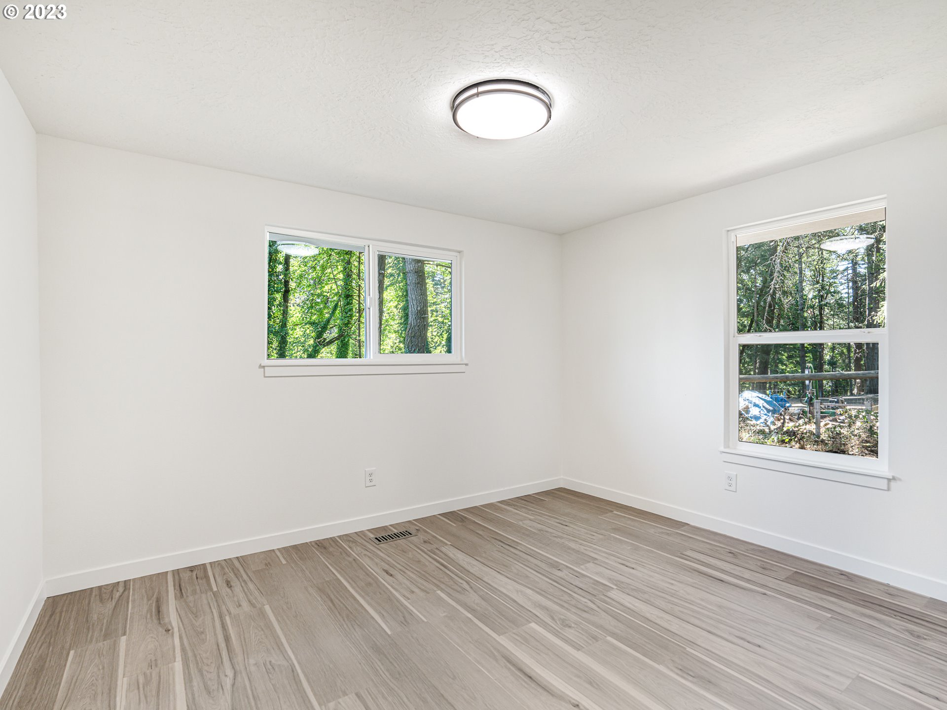 7740 NW HOOD VIEW CIR