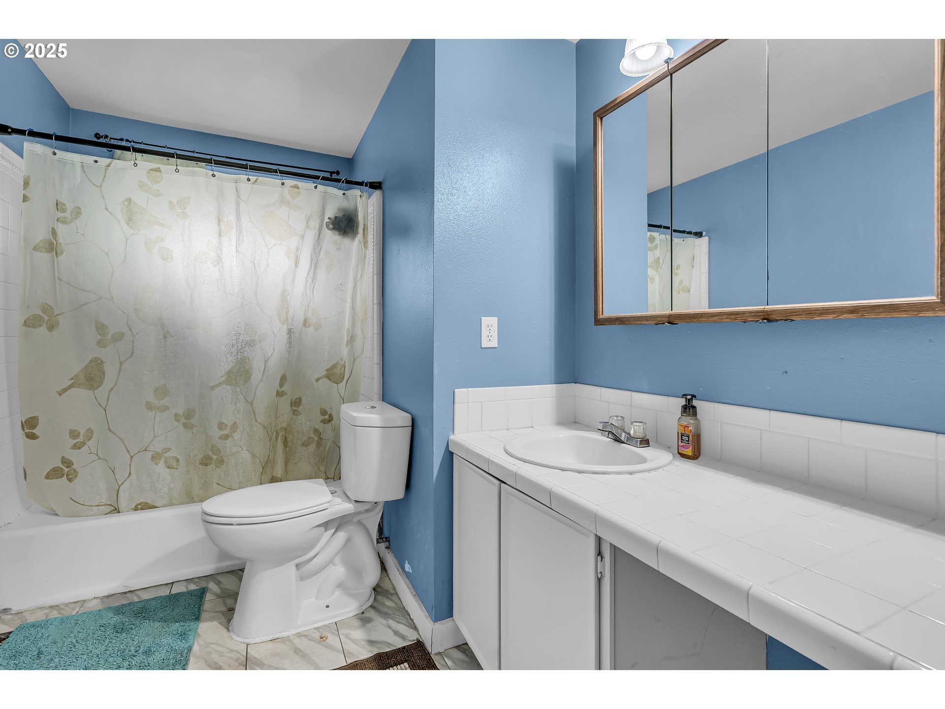 6500 SE MADRONA DR