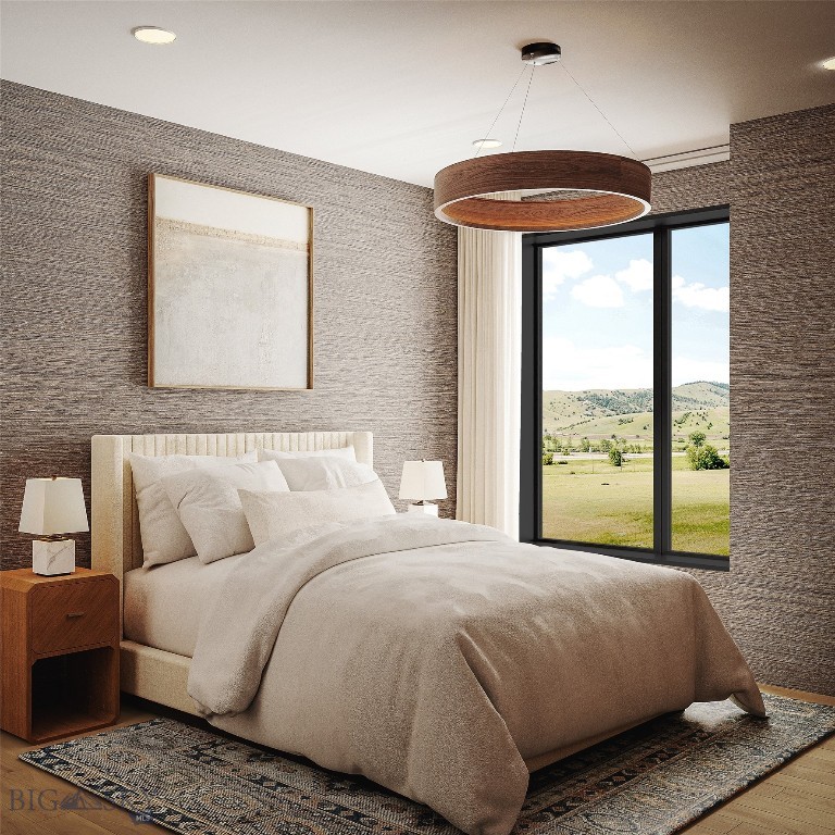 Furnished bedroom with a cream bed, textured walls, and a large window overlooking green hills.