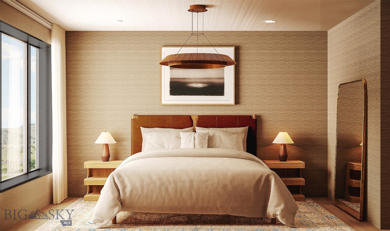 Staged bedroom with a rust-colored headboard, matching bedside tables, and a large window overlooking rolling hills.
