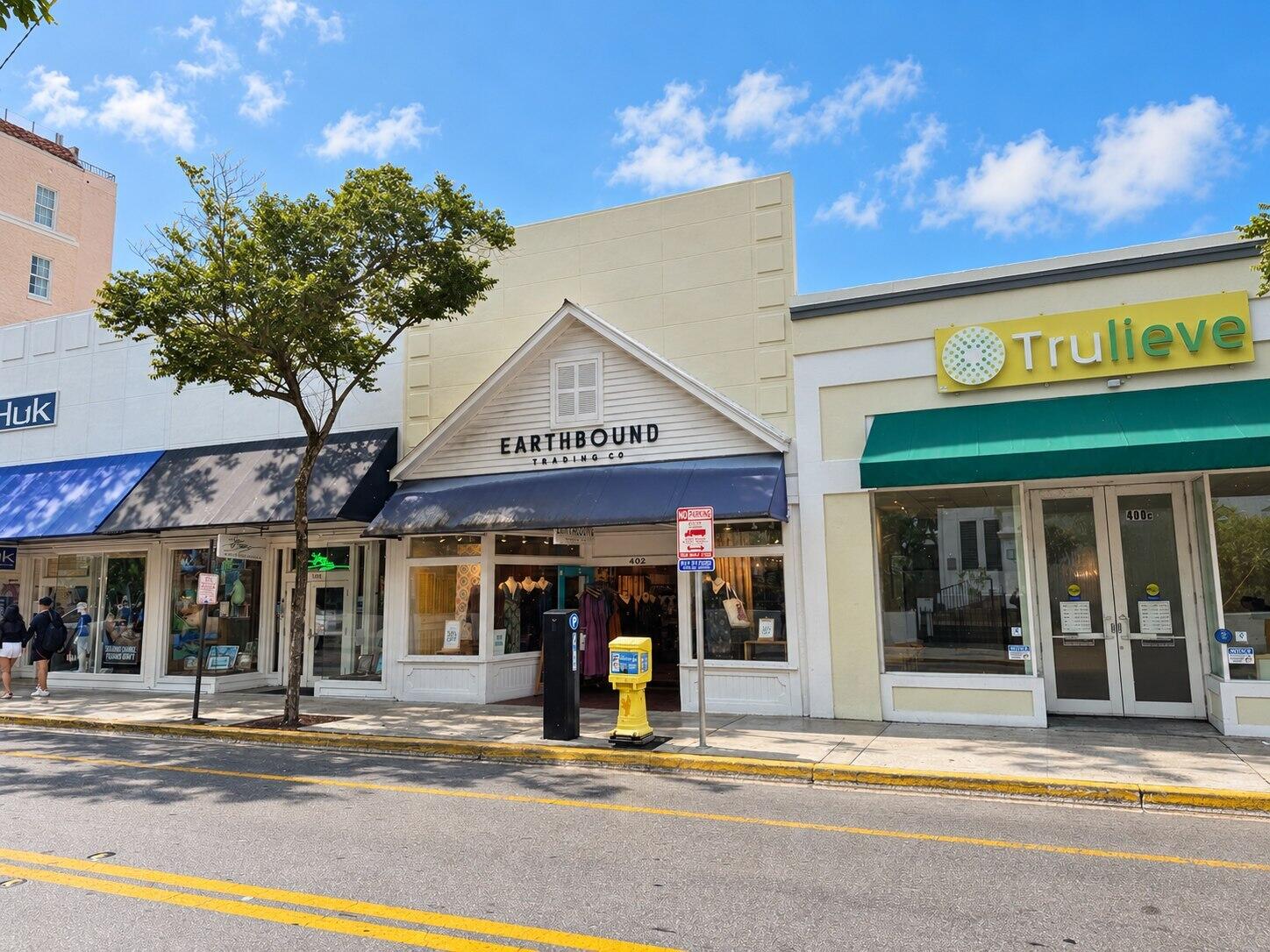 Commercial storefront at 402 Duval Street, with Earthbound Trading Co. and Trulieve signs.