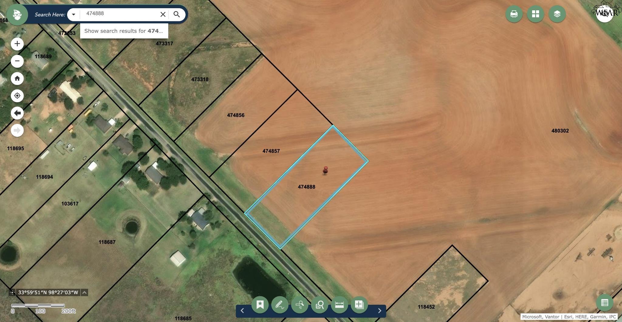 Aerial parcel map highlighting Lot 2, a rectangular field parcel beside a road.