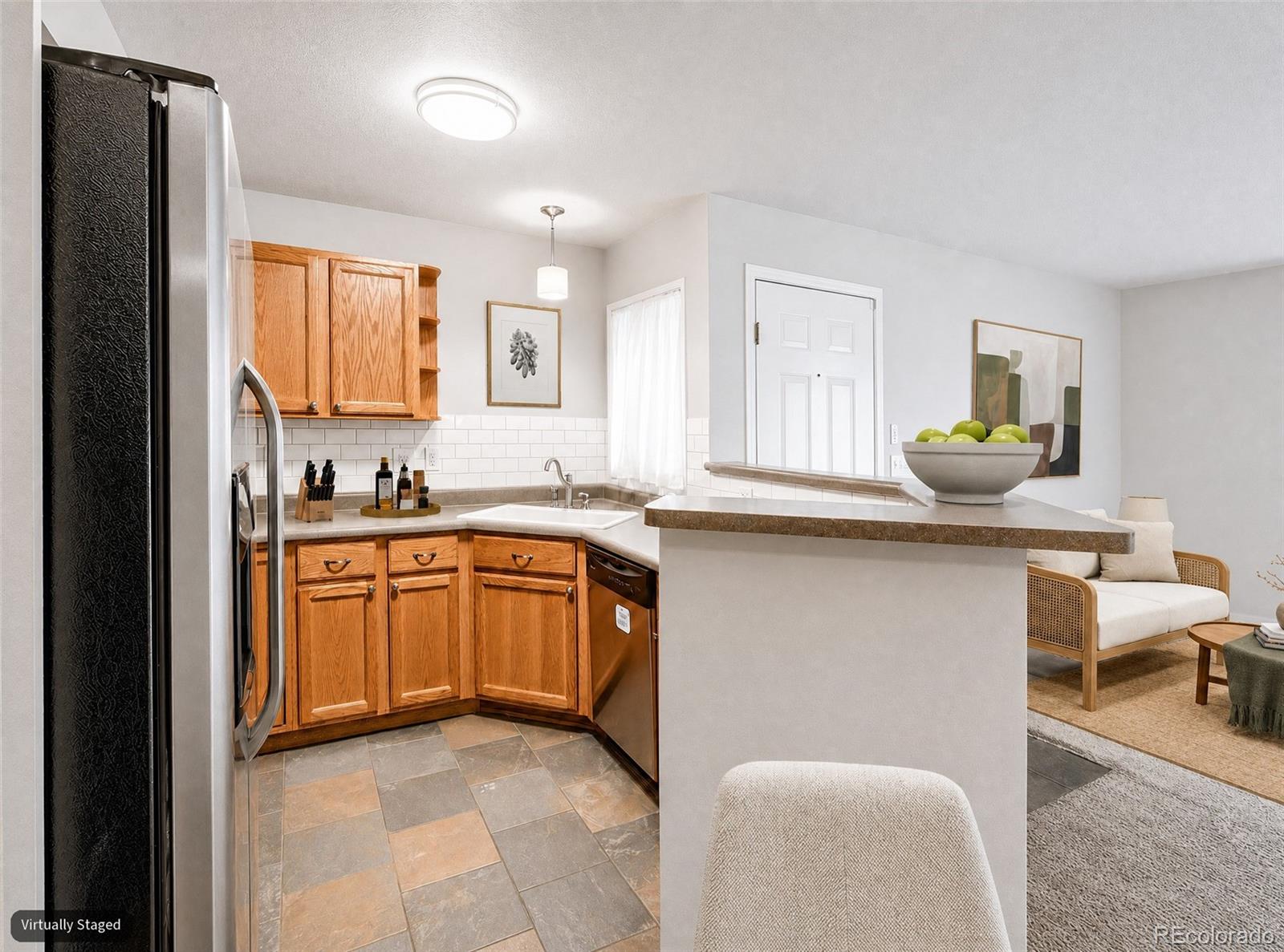 10734 W 63rd Place Unit: 104