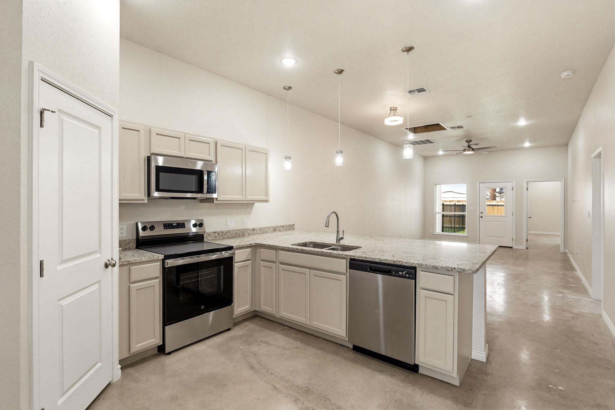 406, 408, & 410 W Ave C