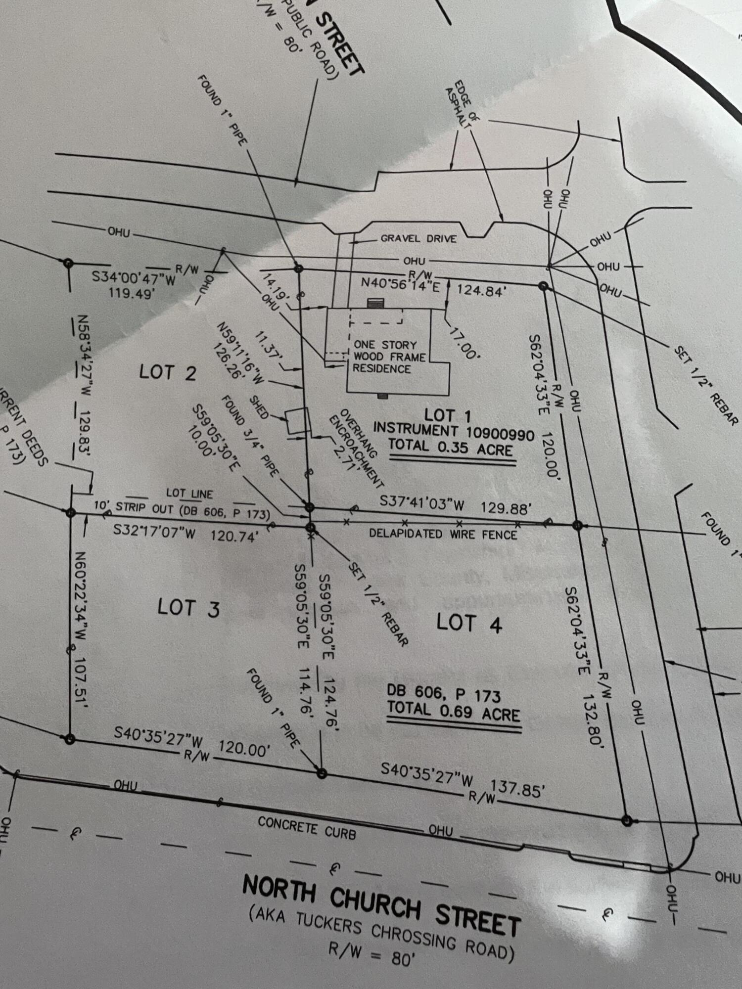 Property survey map showing Lot 1, a residence, lot boundaries, and North Church Street.