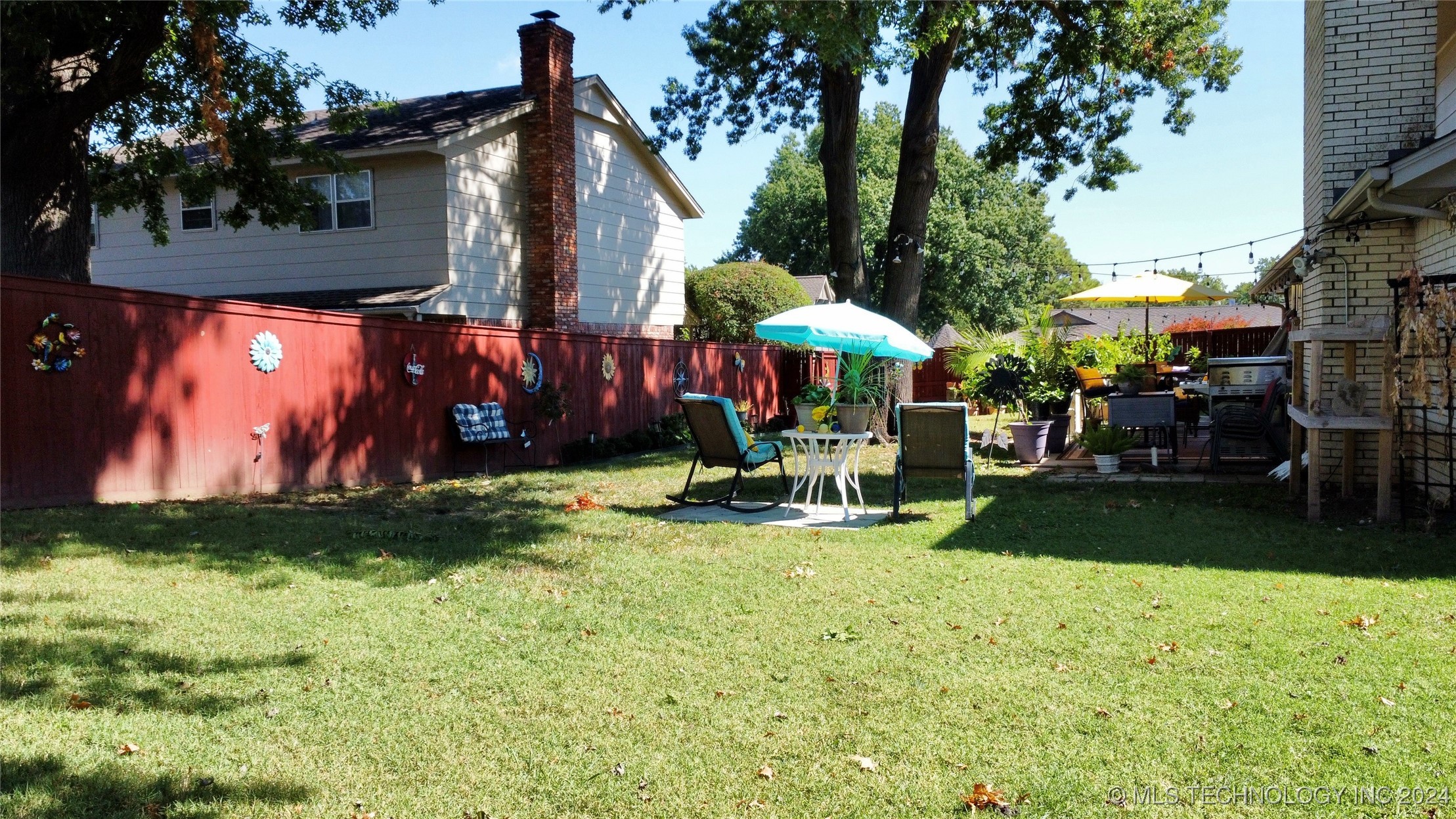 6911 E 64th Place