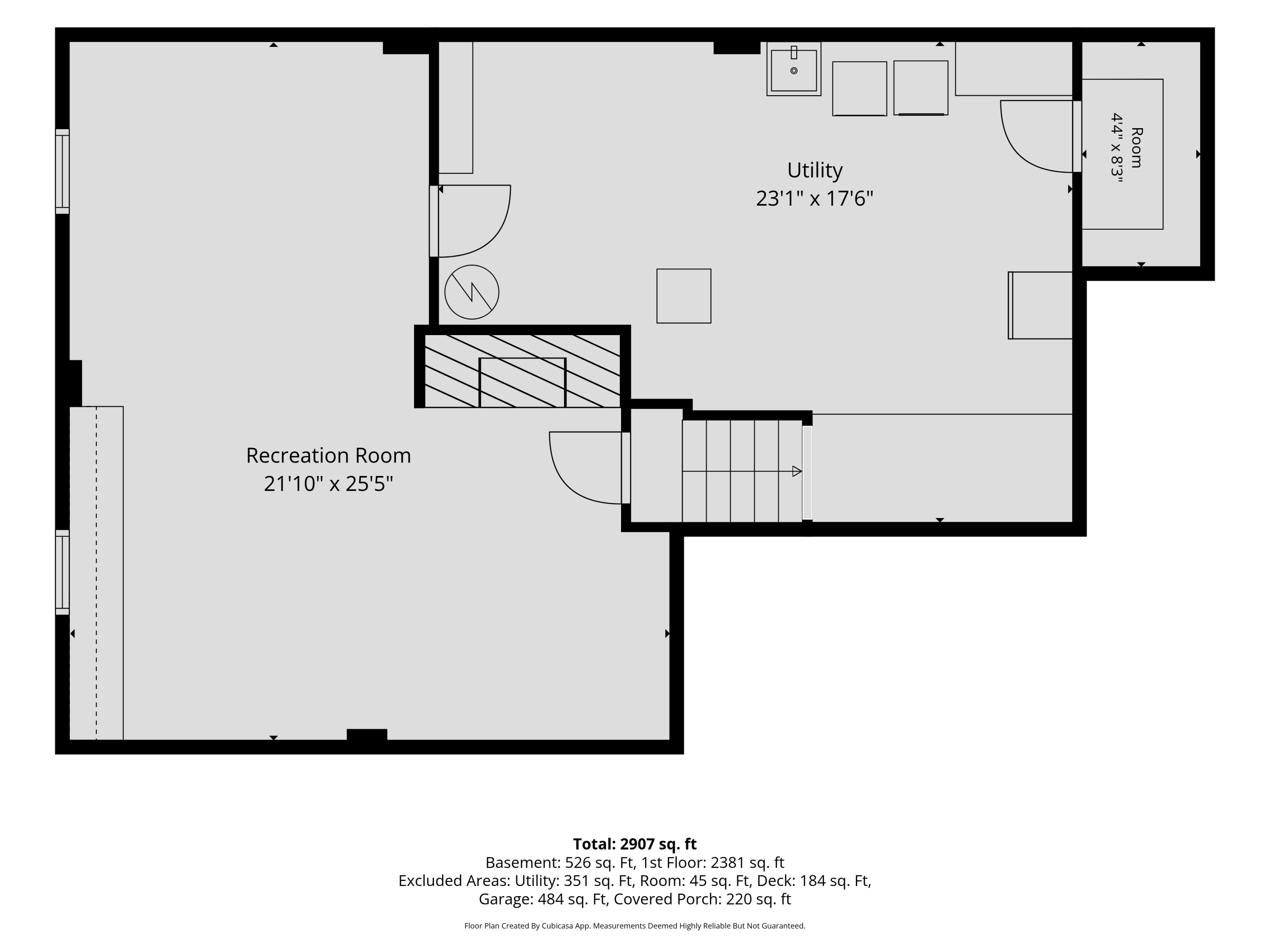 Floor plan showing a large recreation room, utility area, small room, and stairs with dimensions.