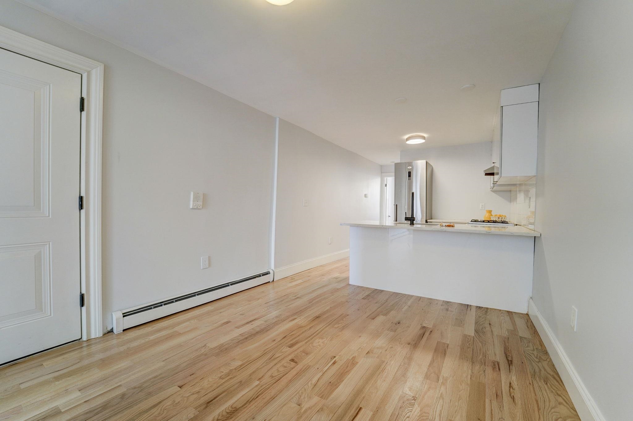 57 MONITOR ST Unit: 1