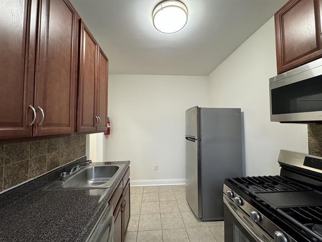 6404 PARK AVE Unit: 13