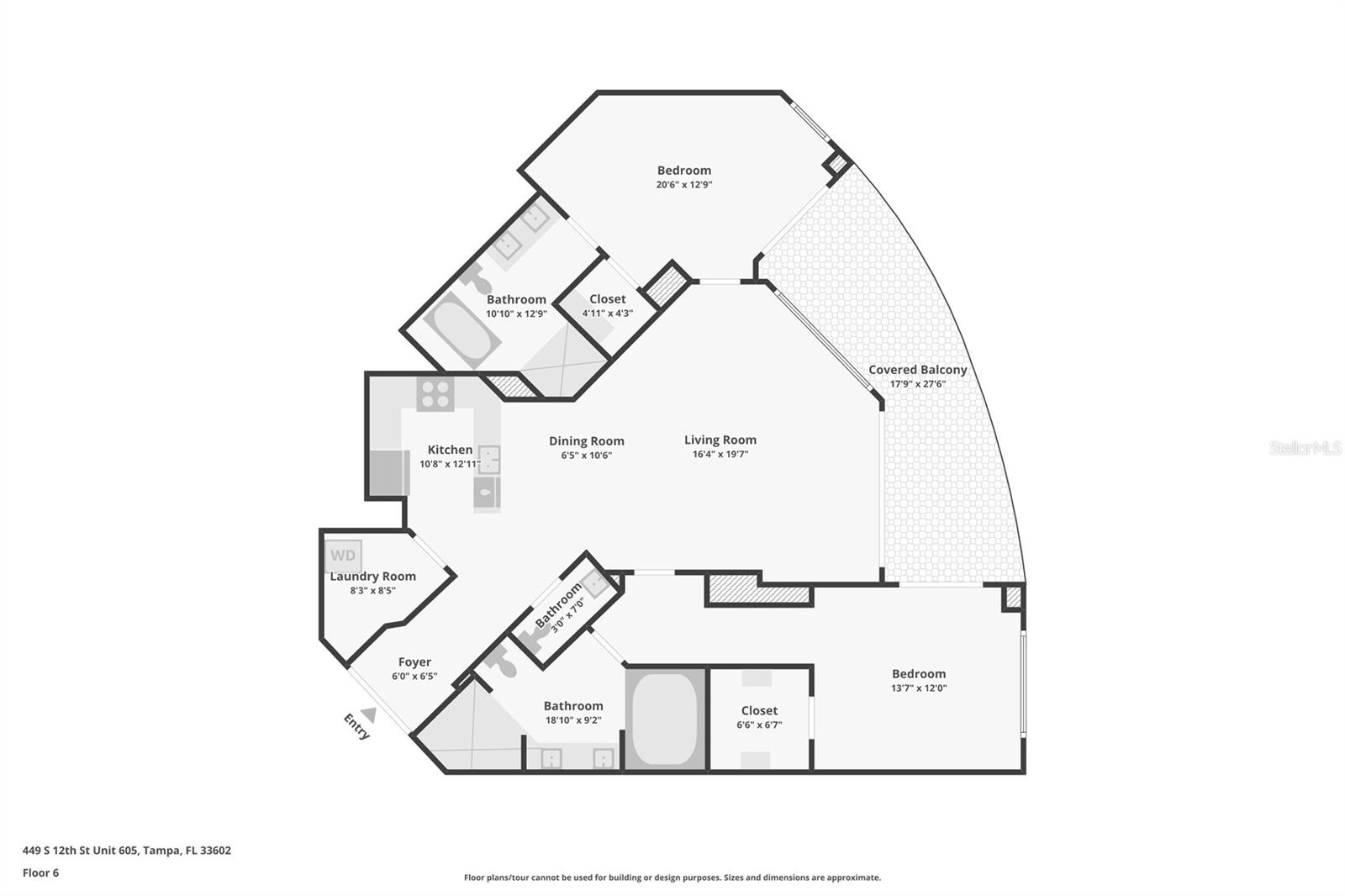 Floor plan of a two-bedroom condo with three bathrooms and a large covered balcony.