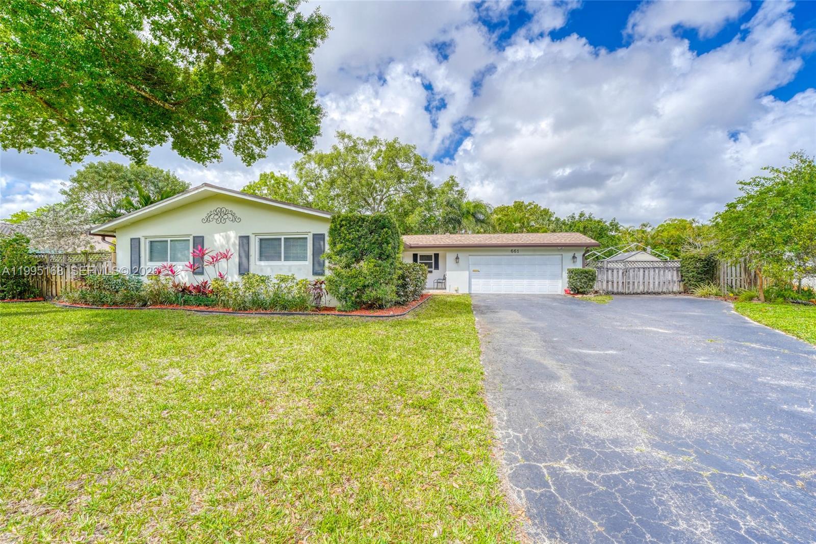 661 NW 66th Ave