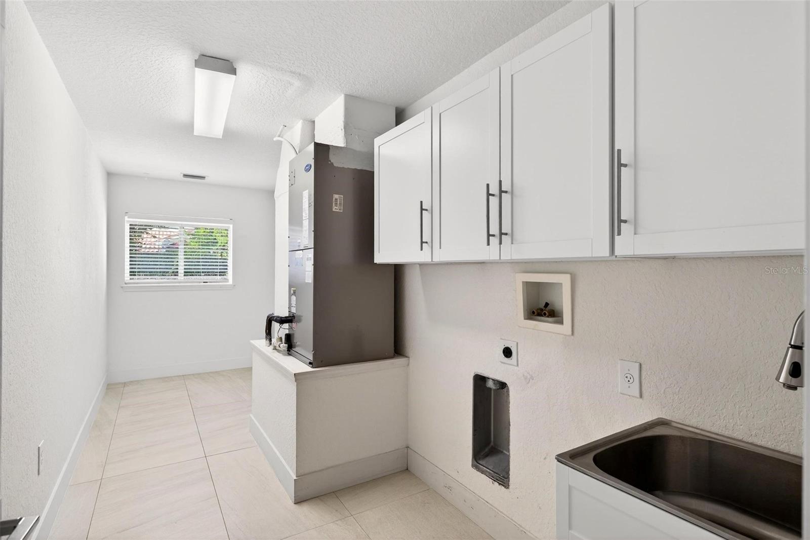 7737 SWISS FAIRWAYS AVE