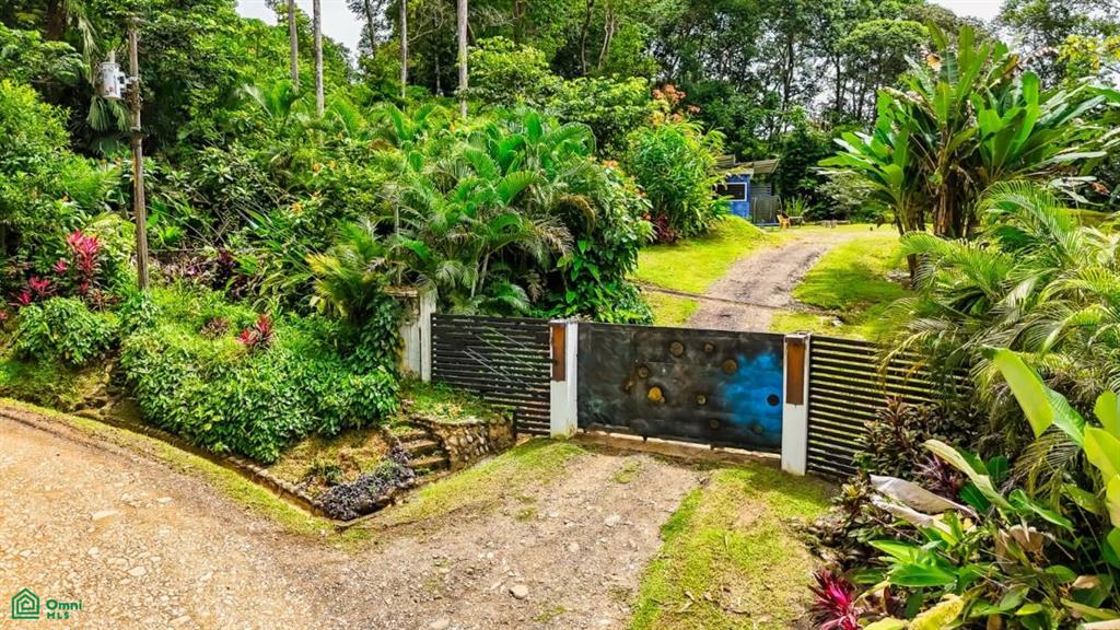 2.2-Acre Mixed-Use Property for Sale in Cinco Ventanas, South Pacific Costa Rica – Container Home, Legal Well & Buildable Terraces