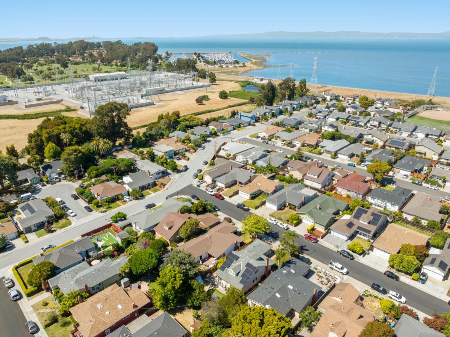 Aerial view of the neighborhood, shoreline, marina, and bay near 240 N Bayshore Boulevard.