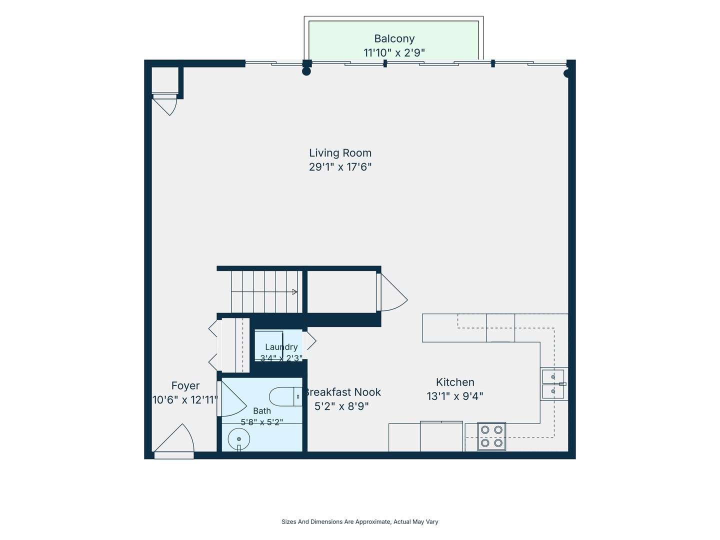 Condo floor plan with a large living room, kitchen, breakfast nook, and balcony.