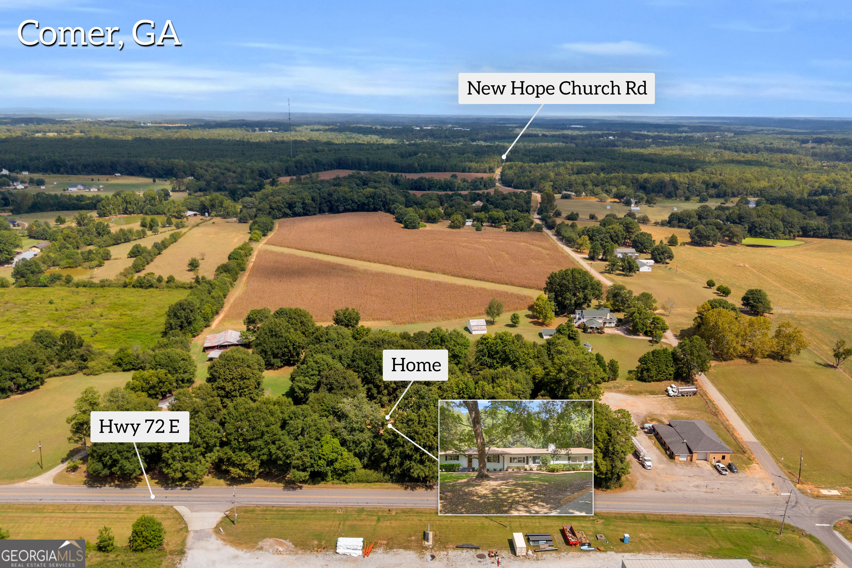 Aerial view of a wooded home and surrounding fields, with Highway 72 East and New Hope Church Road labeled.