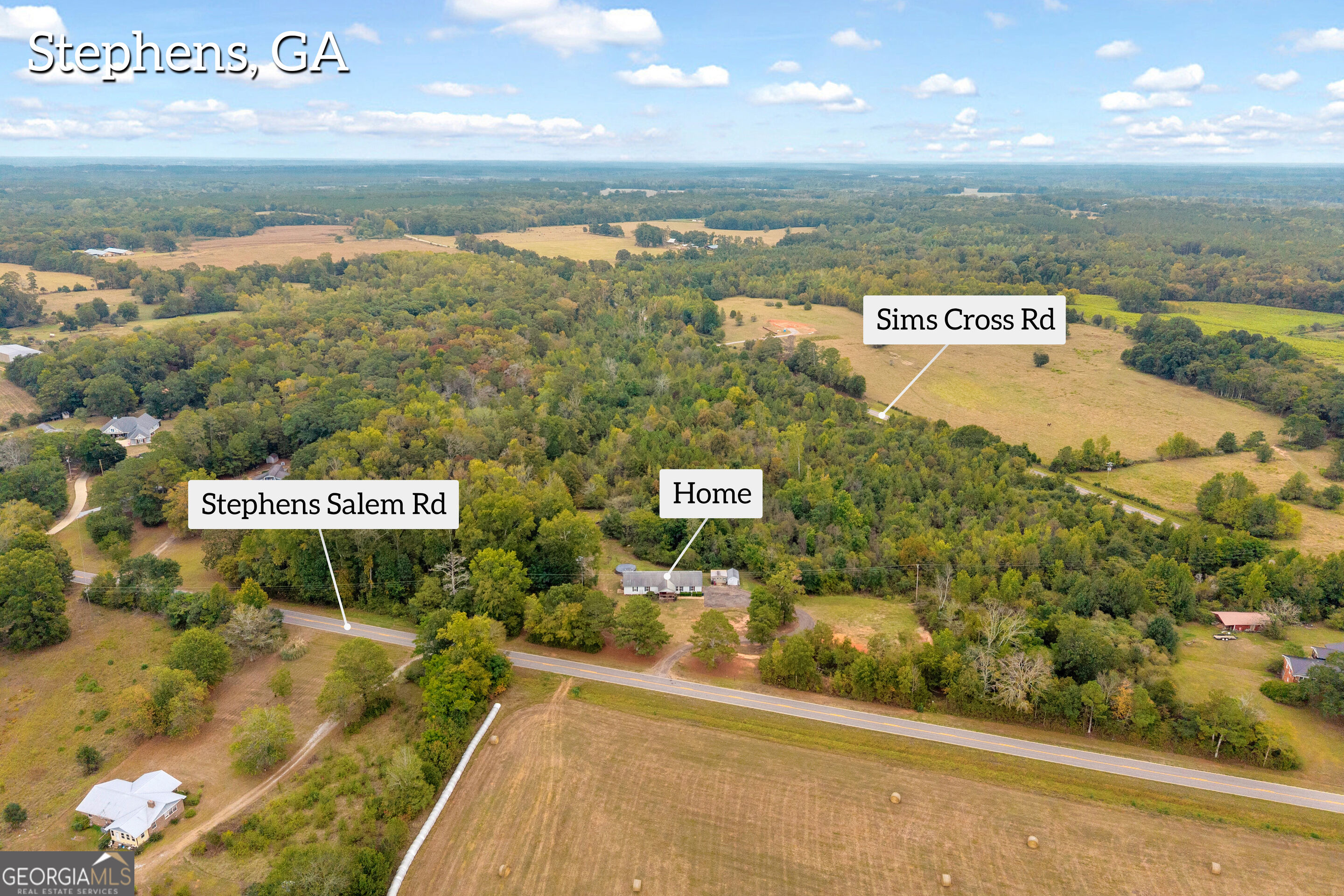 Rural home amid wooded acreage and fields, with Stephens Salem Road and Sims Cross Road nearby.