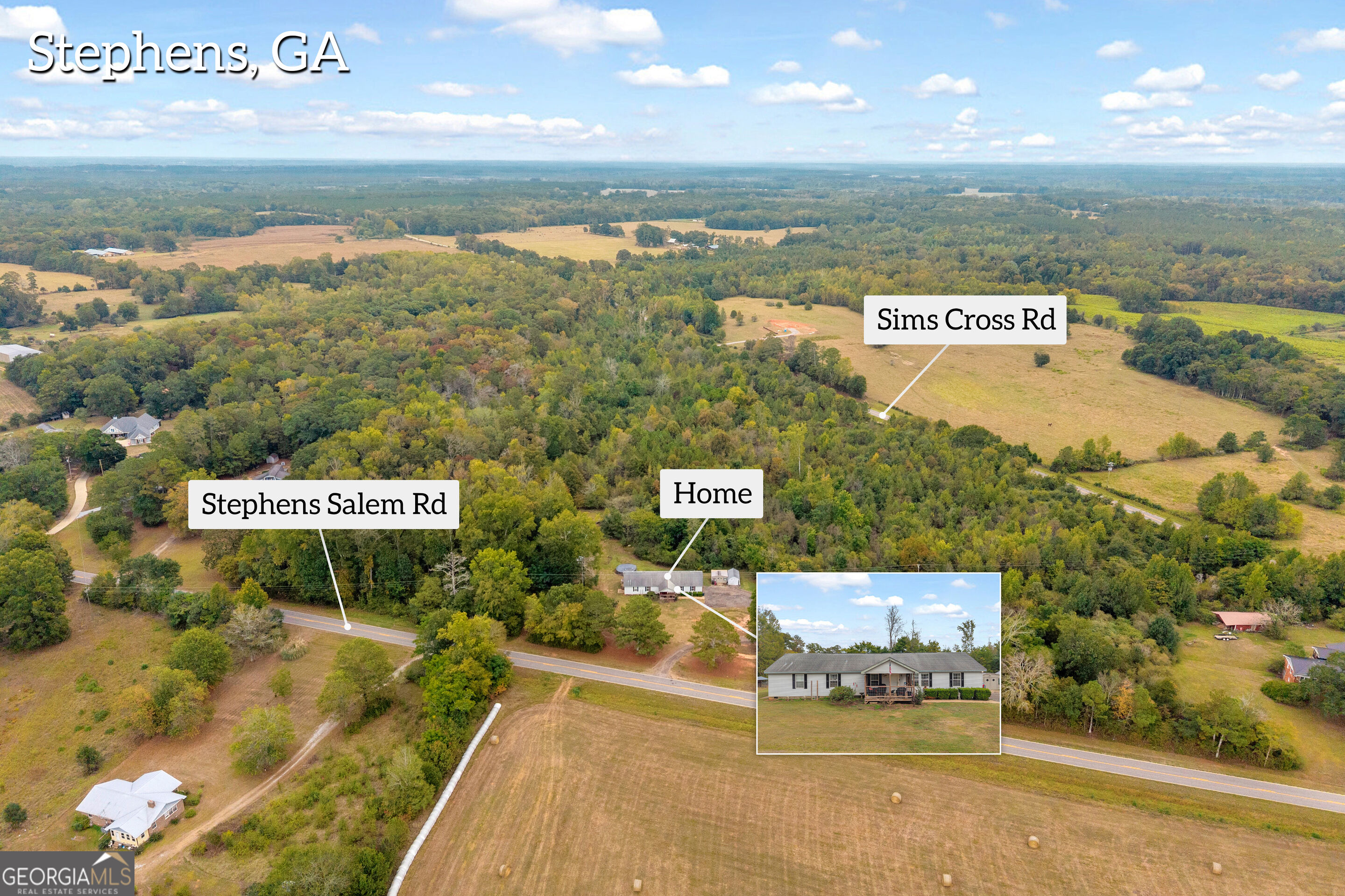 Aerial view of a rural home surrounded by woods and fields, with an inset showing its single-story exterior.