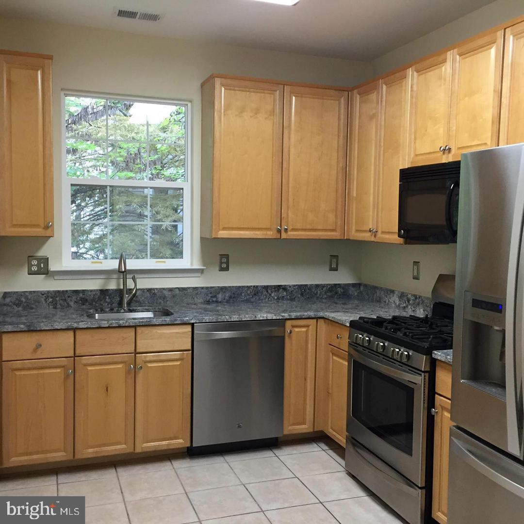 11402 GATE HILL PLACE E