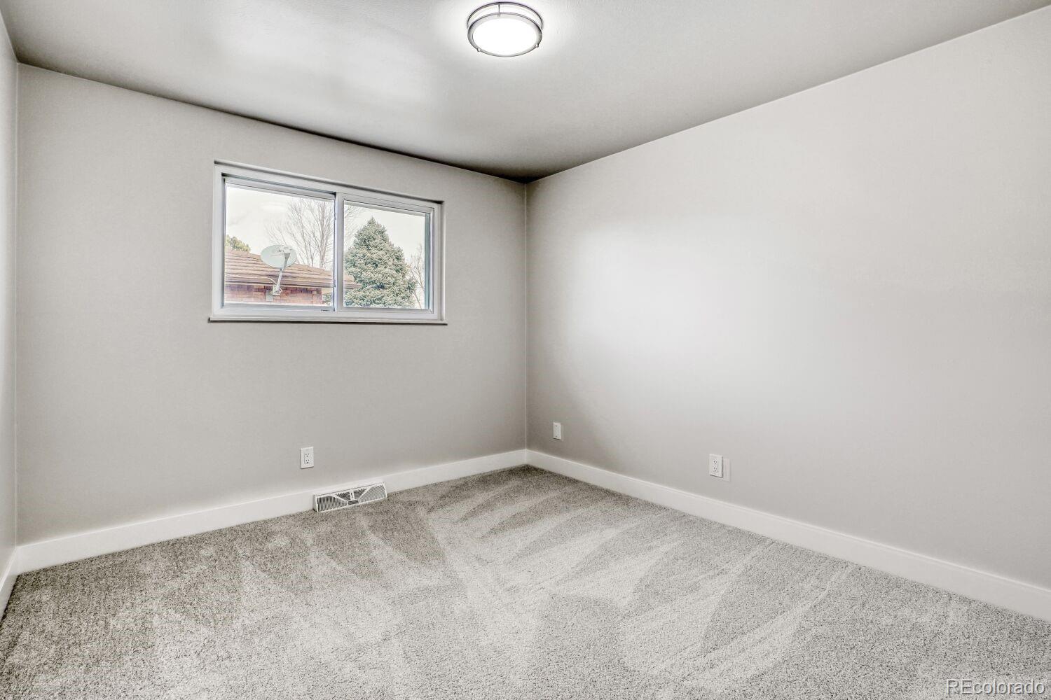 7037 S Newland Street