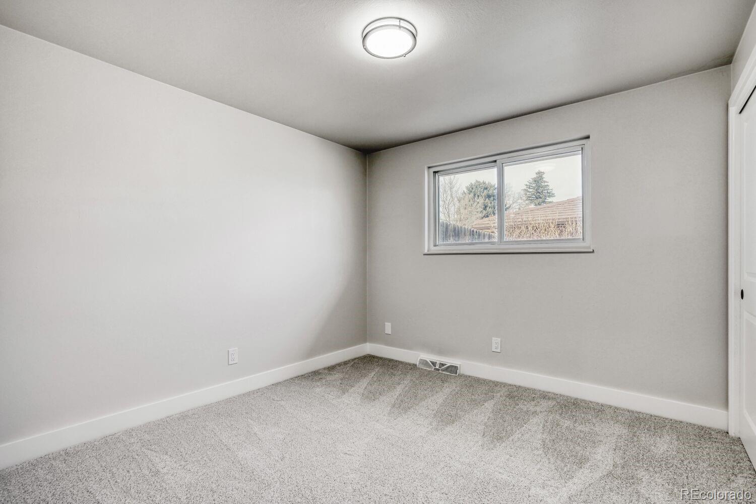 7037 S Newland Street