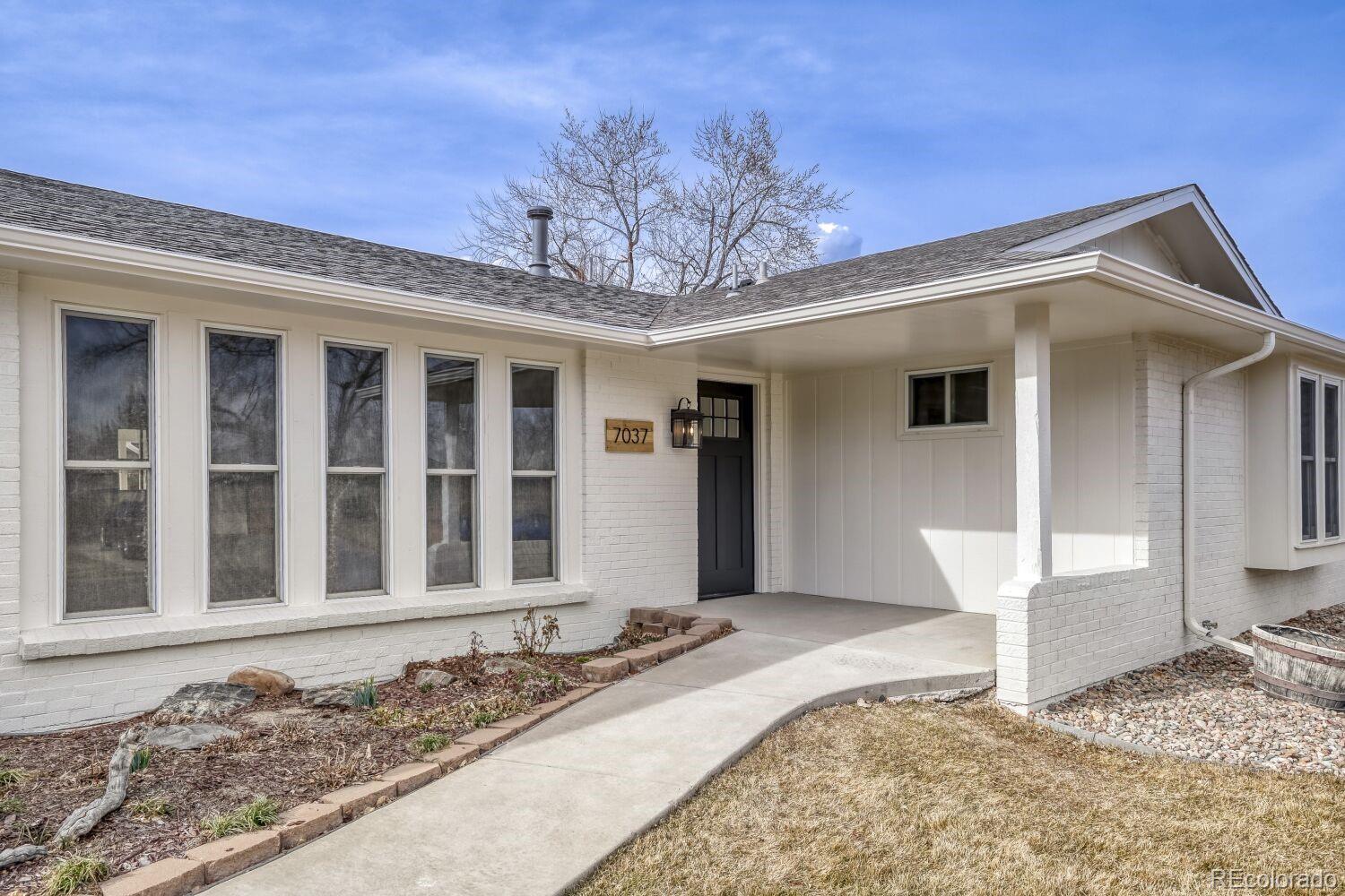 7037 S Newland Street