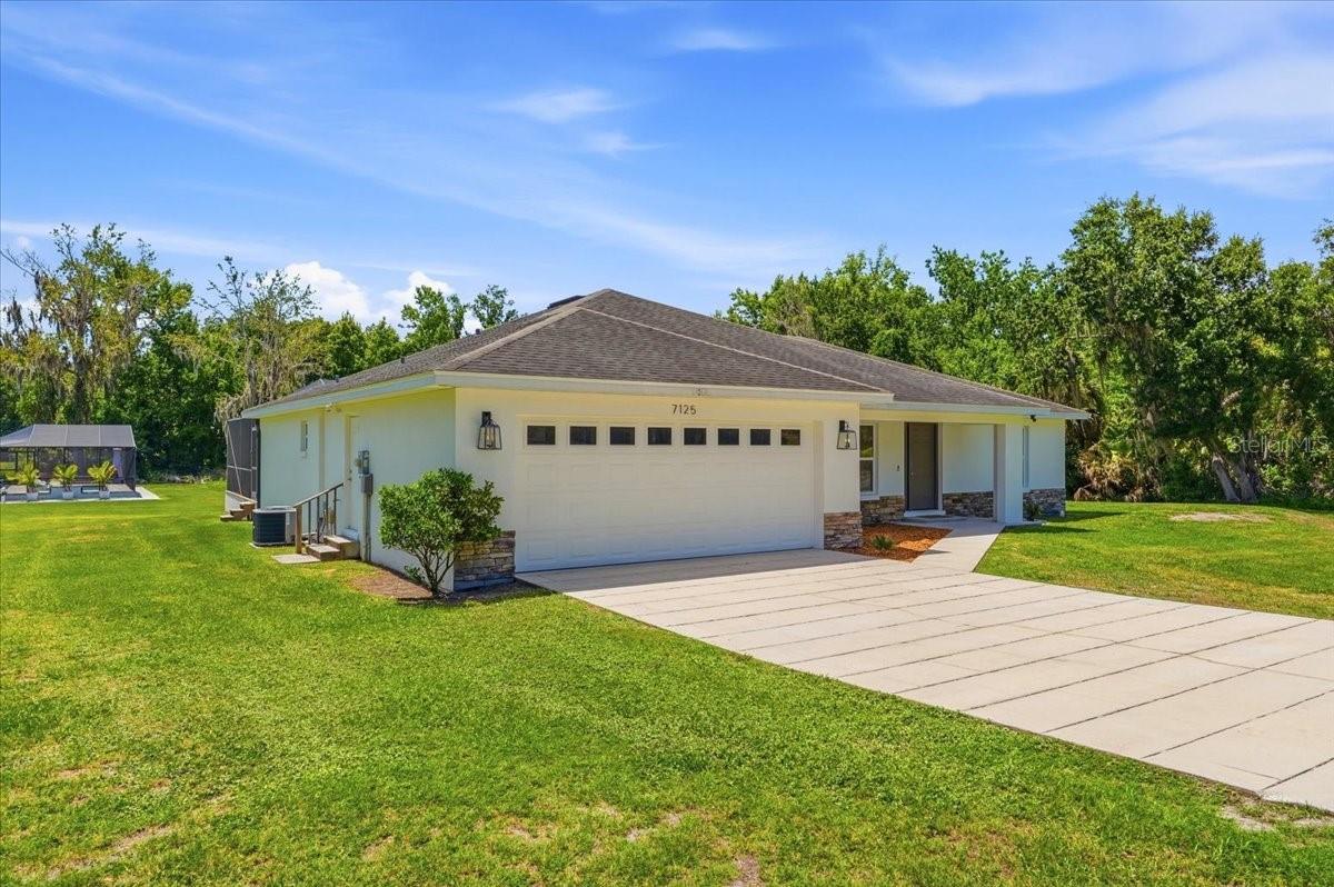 7125 HONEYSUCKLE DR
